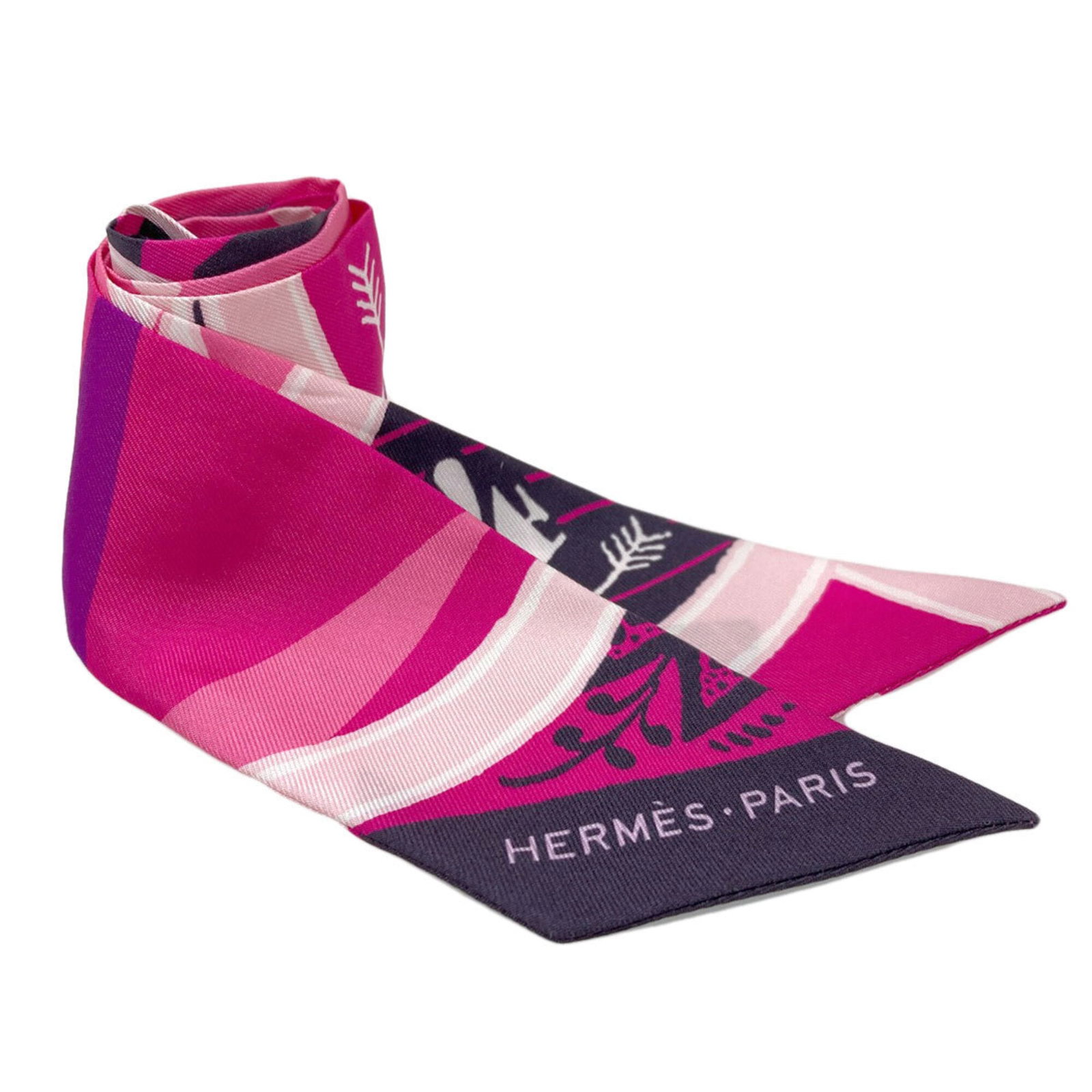 Silk Hermes Scarf: Silk Hermes Scarf Silk from Hermes, this Twilly scarf is a vibrant pink color and measures 85cm x 5cm. Made from high-quality silk, its compact size makes it a unique accessory for any outfit. Item