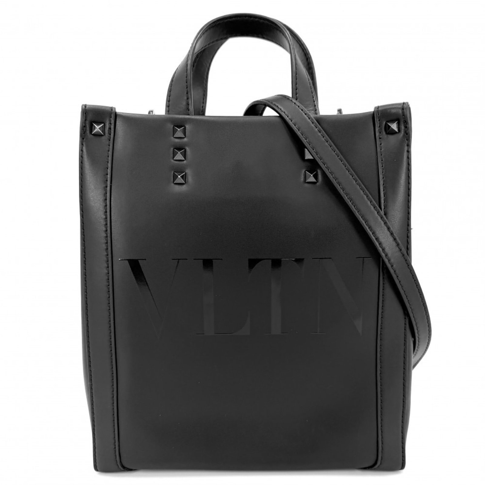 Valentino Garavani Handbag Shoulder Bag Tote Bag Leather: Valentino Garavani Handbag Shoulder Bag Tote Bag Leather The Valentino Garavani Handbag Shoulder Bag Tote Bag Leather is a sleek and sophisticated black leather tote bag. Measuring 24cm x 21cm x 8cm,