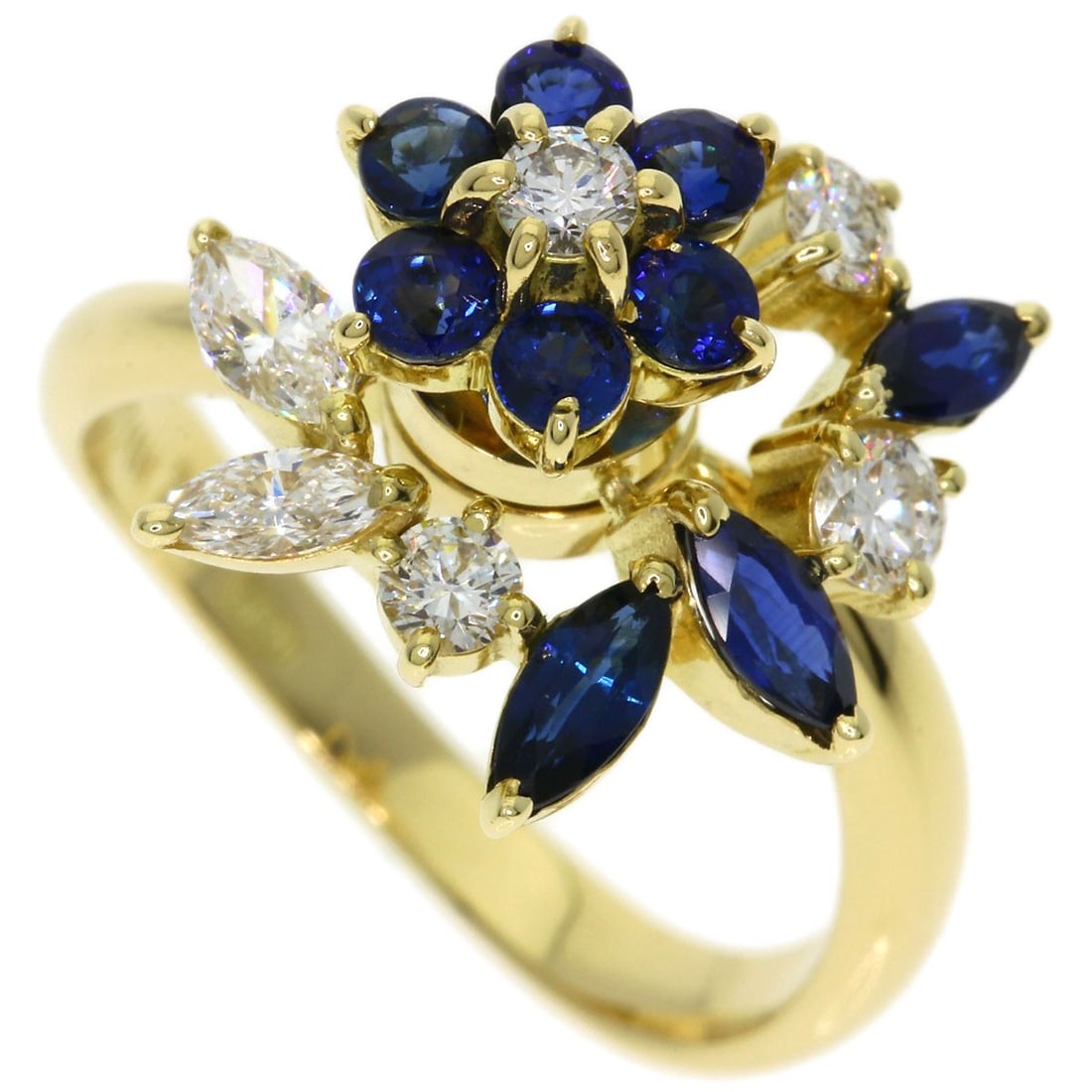 Waltham Flower Swing Sapphire Diamond Ring K18 Yellow Gold: Waltham Flower Swing Sapphire Diamond Ring K18 Yellow Gold K18 Yellow Gold Waltham Flower Swing Sapphire Diamond Ring is a stunning piece featuring a sapphire main stone set in 18k yellow gold. The