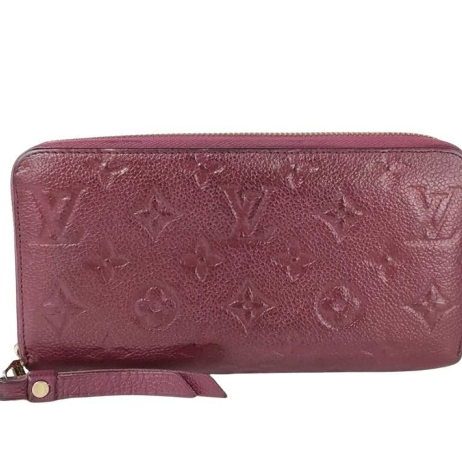 Bi Fold Monogram Empreinte Wallet Louis Vuitton: Bi Fold Monogram Empreinte Wallet Louis Vuitton Monogram Empreinte Wallet in Rich Purple: A luxurious bi-fold wallet from Louis Vuitton's iconic Monogram Empreinte collection, featuring a striking