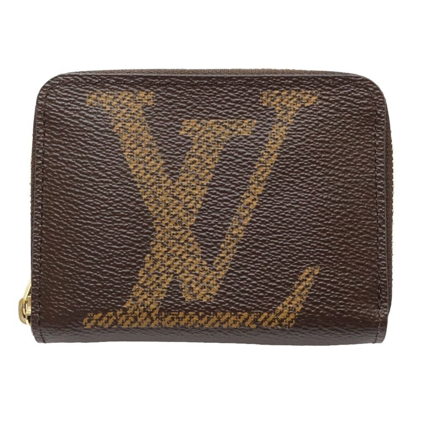 Coin purse Monogram Louis Vuitton: Coin purse Monogram Louis Vuitton This Louis Vuitton Monogram coin purse boasts a classic design with a signature brown color and iconic monogram pattern. Measuring 8.5cm x 11cm x 2cm, it's a stylish 