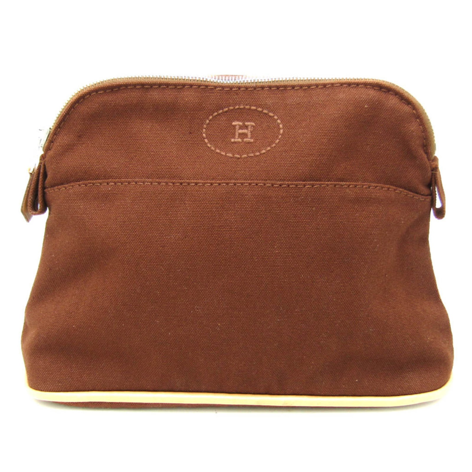 Cotton Leather Pouch Hermes: Cotton Leather Pouch Hermes Cotton Leather Pouch from Hermes' Bolide Line. This unique pouch features a combination of cotton and leather materials, with a distinctive brown color and a sleek design. 