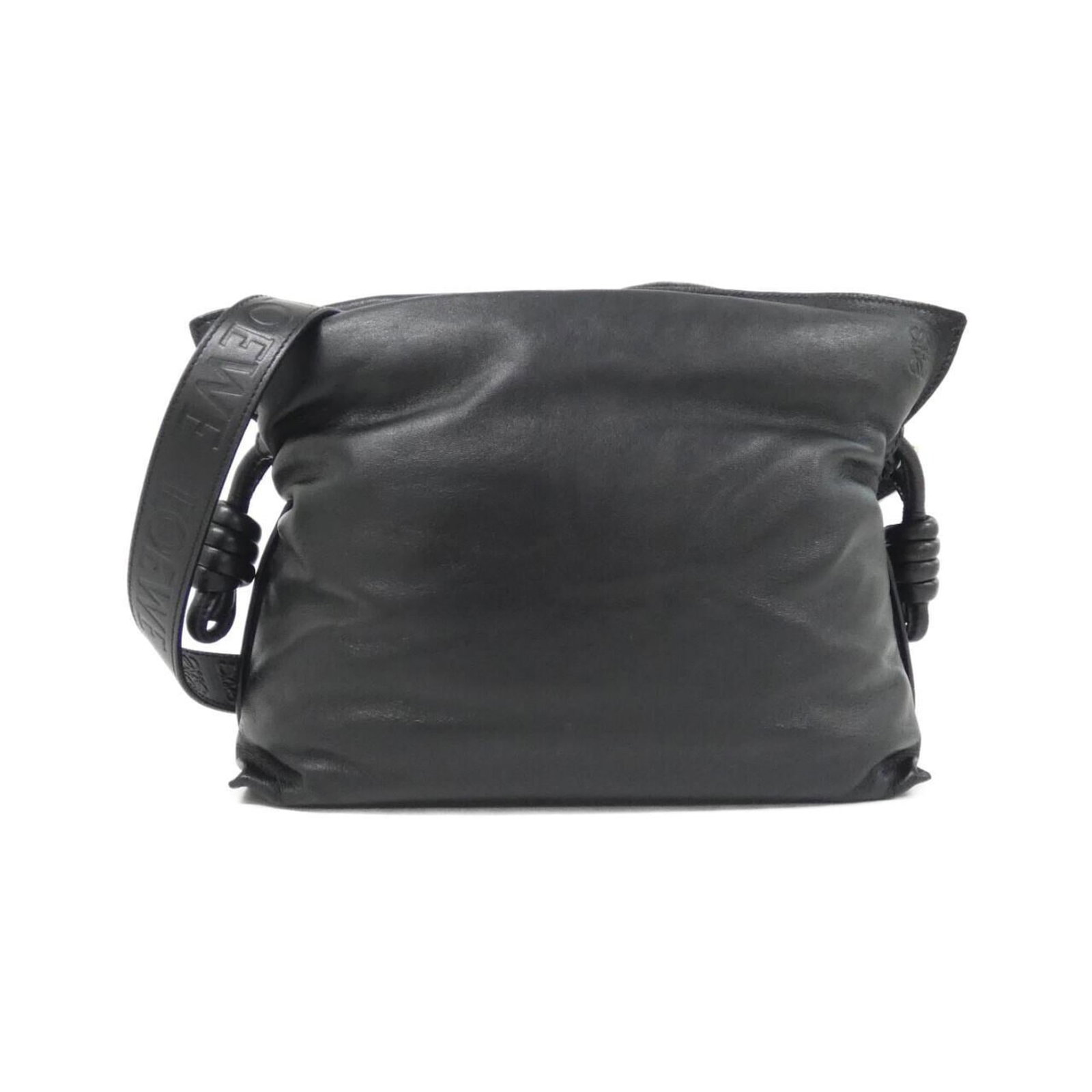 Handbag Leather Handbag: Handbag Leather Handbag Black leather handbag with a structured design, made from high-quality calfskin and lamb leather, features a classic style and elegant finish. The bag comes with a dust bag