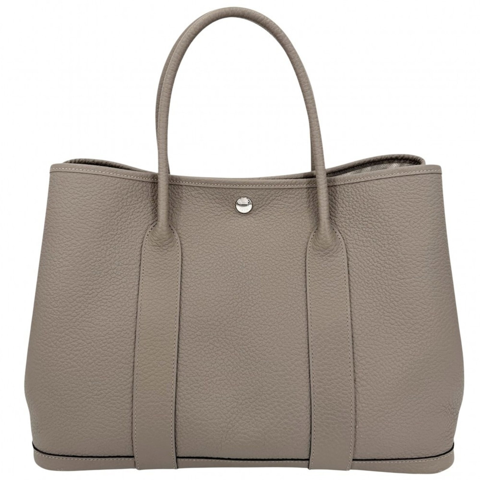 Leather Handbag Hermes Tote: Leather Handbag Hermes Tote Leather Handbag in Beige, a classic tote bag from the renowned French fashion house Hermes, boasts a timeless design and premium leather construction. Measuring 26cm x