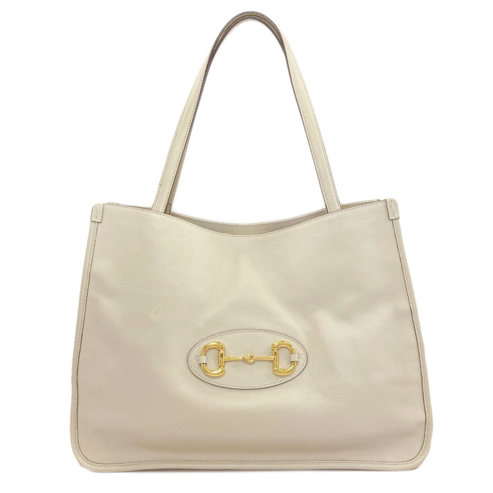Gucci Tote Bag Leather: Gucci Tote Bag Leather Gucci Tote Bag Leather is a high-quality leather tote bag from the renowned Italian fashion brand Gucci. Measuring 26.5cm x 34cm x 14.5cm, this cream-colored bag features a