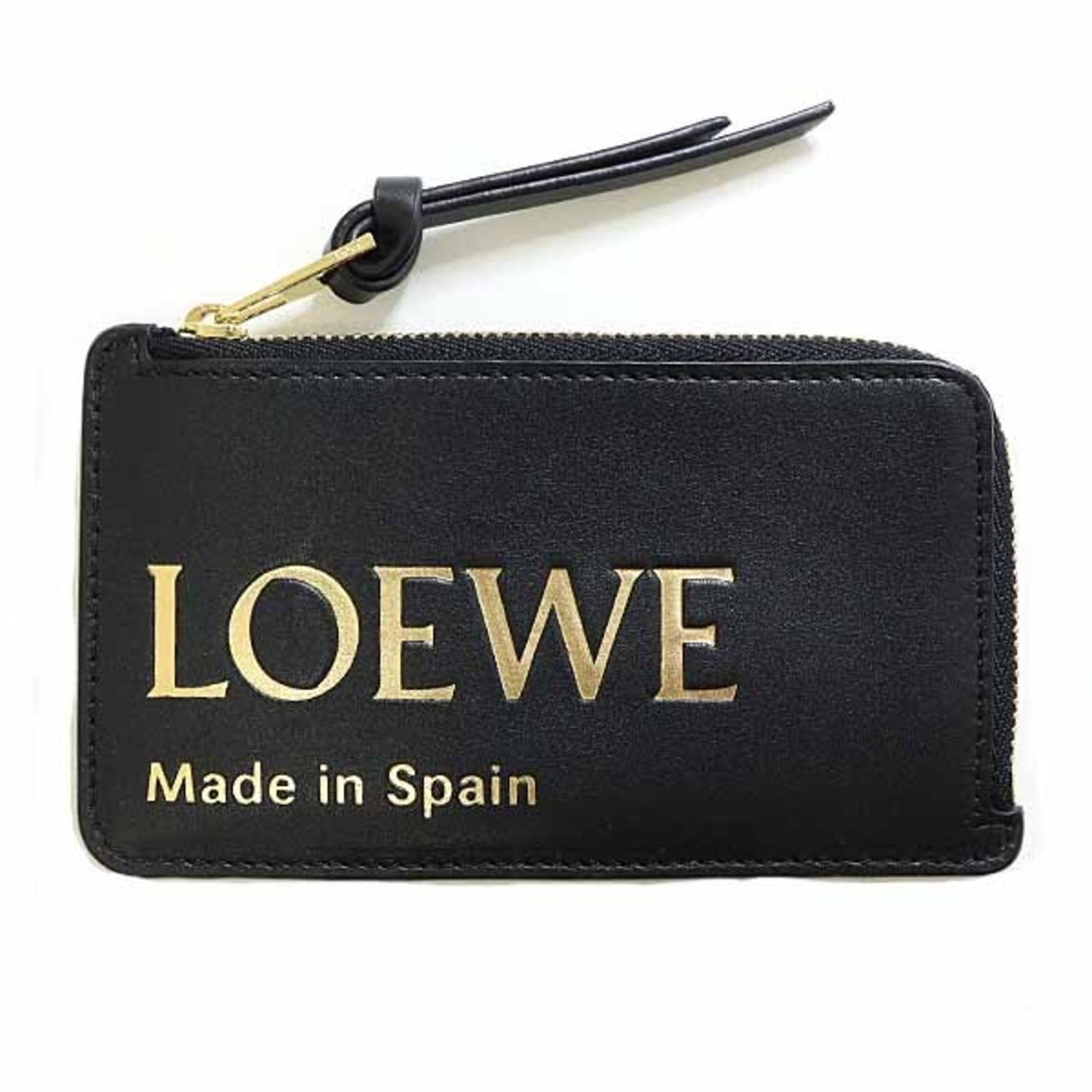 Loewe Coin Purse/ Coin Case Leather: Loewe Coin Purse/ Coin Case Leather Black Loewe Coin Purse/ Coin Case features a sleek design made from high-quality Calfskin leather. The coin purse is closed with a zipper and comes with a