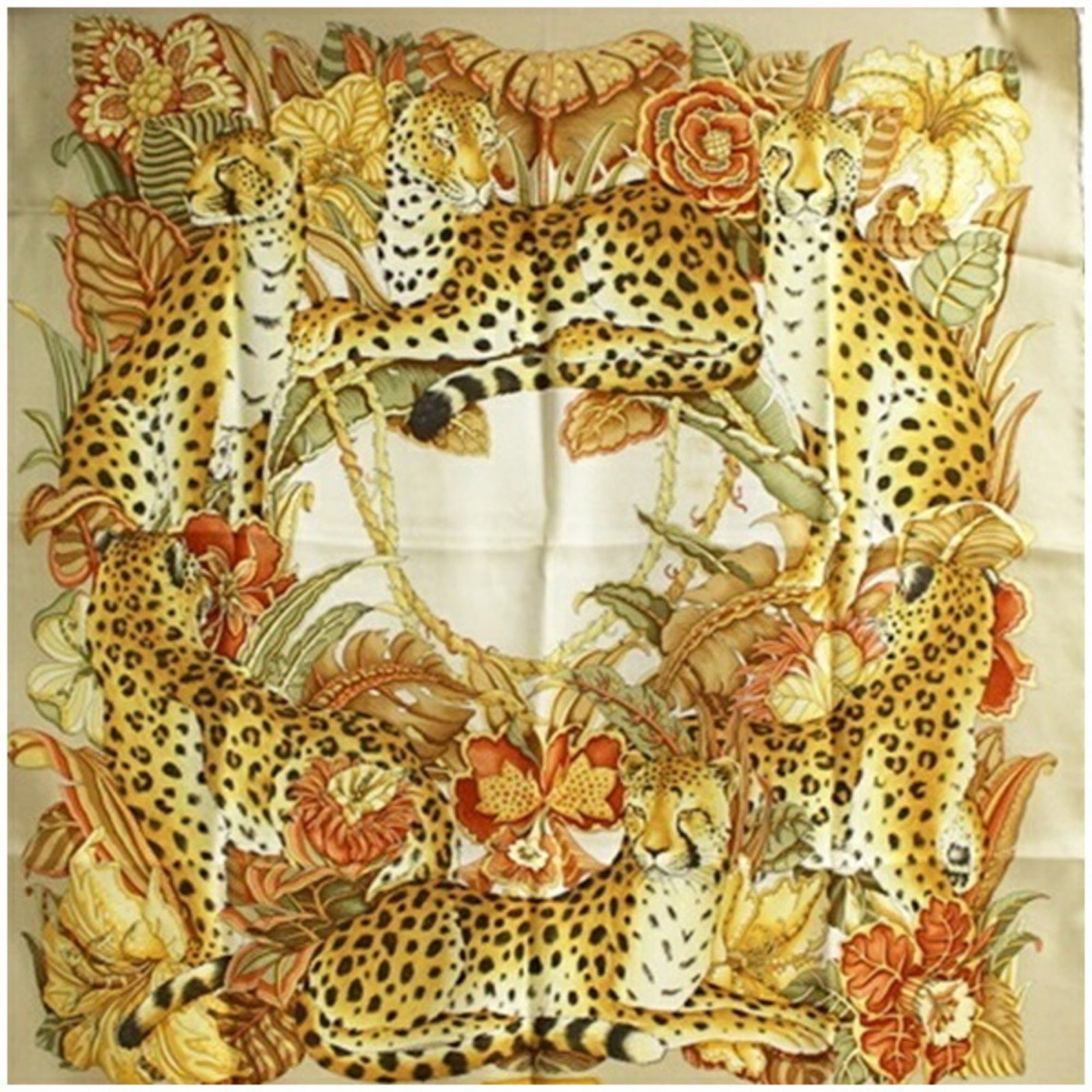 Salvatore Ferragamo Scarf: Salvatore Ferragamo Scarf Beige and cream hues blend in this Salvatore Ferragamo scarf, a stylish accessory for men and women. The scarf's neutral color palette makes it versatile for various