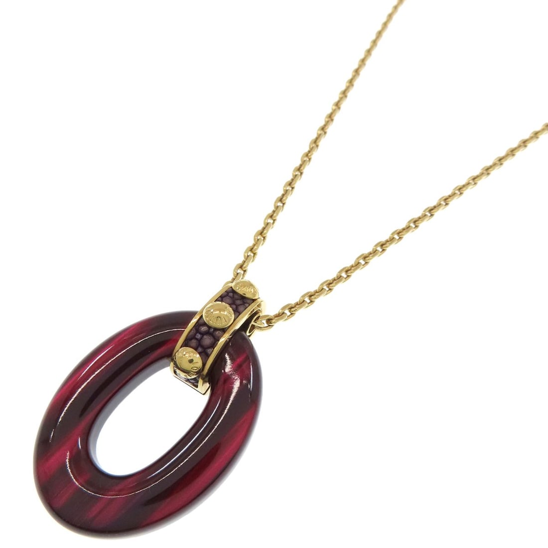 Pandanti Crew Louis Vuitton Metal Necklace: Pandanti Crew Louis Vuitton Metal Necklace Red Louis Vuitton Metal Necklace with a 55-59 length, bearing a signature. This necklace is made of metal and features a distinctive red exterior color.