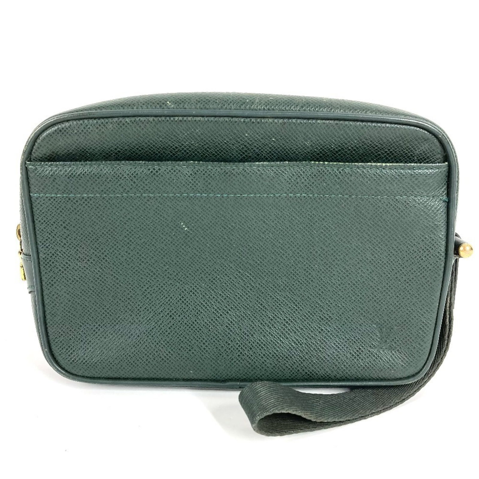 Handbag Clutch Bag Louis Vuitton Pouch Taiga Leather: Handbag Clutch Bag Louis Vuitton Pouch Taiga Leather Taiga leather gives this Louis Vuitton clutch bag its distinctive look, while Episea green adds a touch of elegance. Measuring 14.5cm x 22cm x
