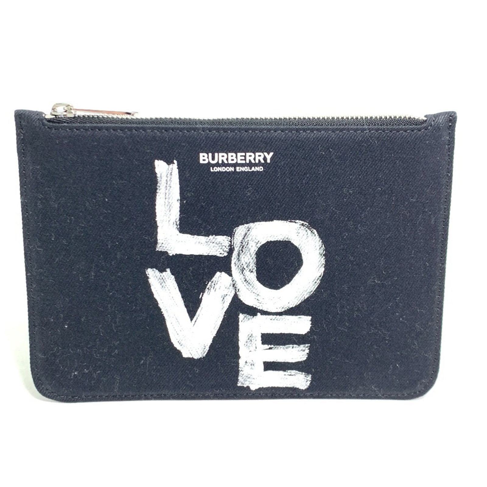 Burberry Coin Purse/ Coin Case Canvas: Burberry Coin Purse/ Coin Case Canvas Canvas Coin Purse from Burberry Features a Classic Design. Made from high-quality canvas, this black and white coin purse boasts a timeless design that will