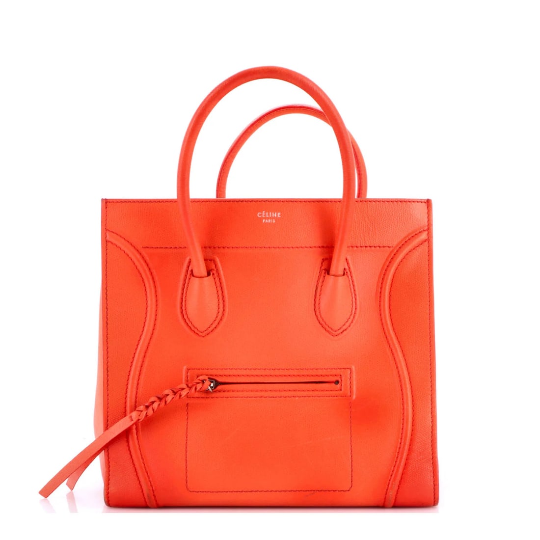 Phantom Bag Large Grainy Leather Celine: Phantom Bag Large Grainy Leather Celine The Phantom Bag Large Grainy Leather Celine boasts a striking orange exterior with heavy cracking on corners and edge wear, giving it a unique, worn-in look.