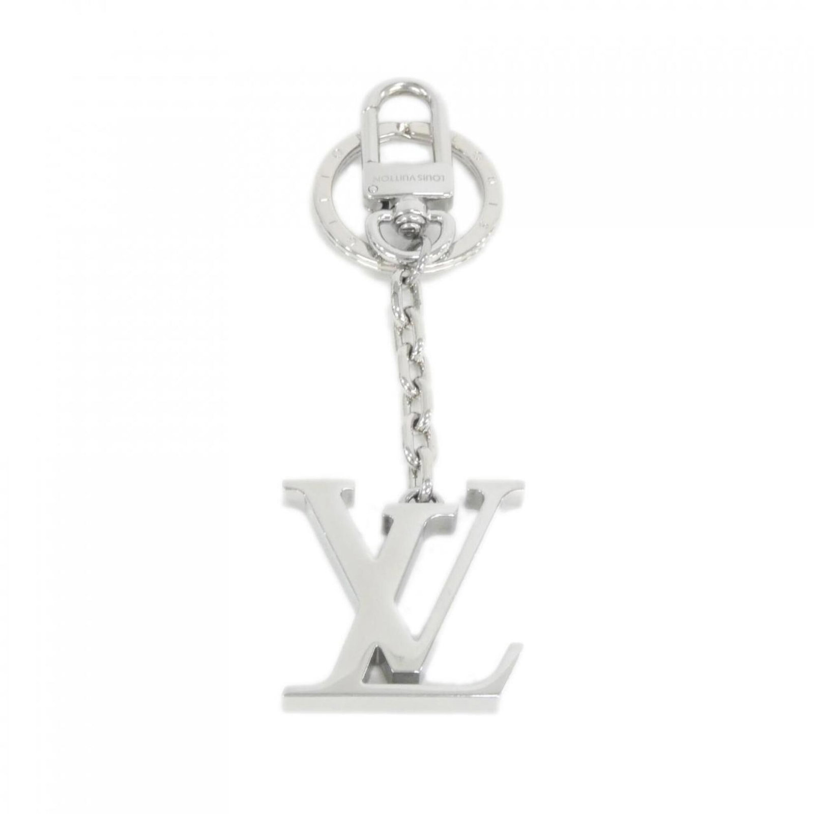 Keyring from Louis Vuitton: Keyring from Louis Vuitton Silver Louis Vuitton keyring. A sleek and sophisticated accessory, this keyring bears the iconic brand's signature style. Made from high-quality materials, it adds a touch o