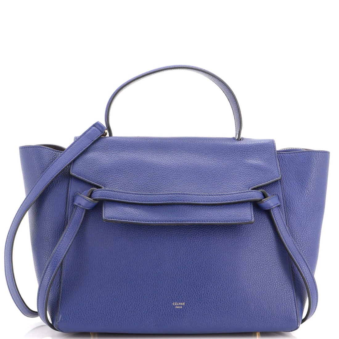 Textured Leather Mini Belt Bag Celine: Textured Leather Mini Belt Bag Celine This textured leather mini belt bag from Celine boasts a striking blue exterior with a sleek, sophisticated design. The bag's interior features a luxurious suede
