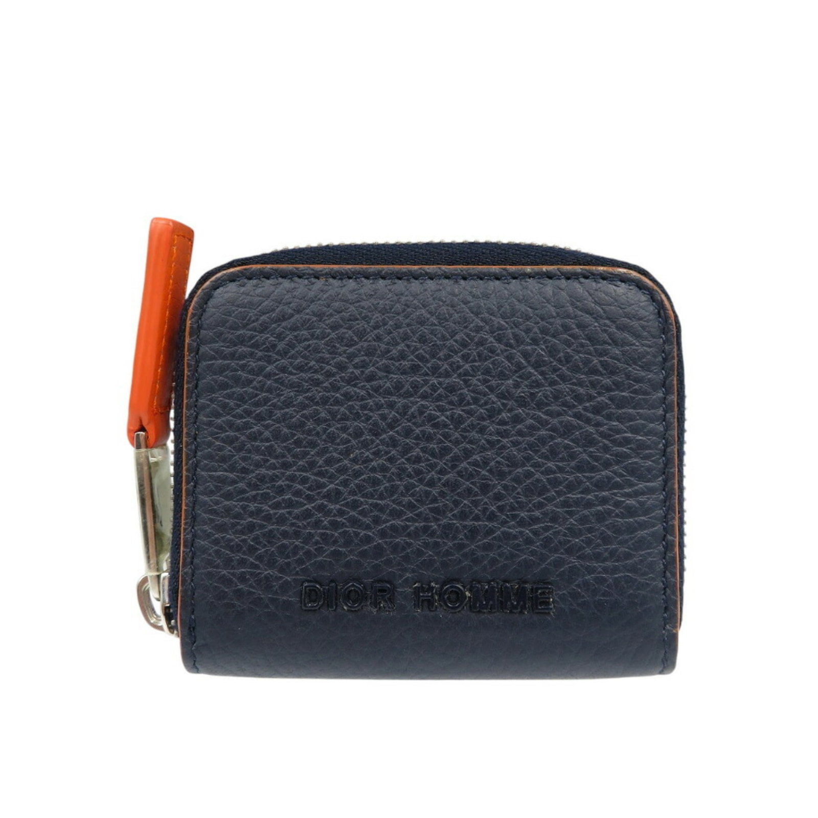 Dior Homme Coin Purse/ Coin Case Leather: Dior Homme Coin Purse/ Coin Case Leather The Dior Homme Coin Purse is a sleek and stylish leather accessory, available in two colors: Navy and Orange. Measuring 7cm x 8cm x 1.5cm, it features a classi