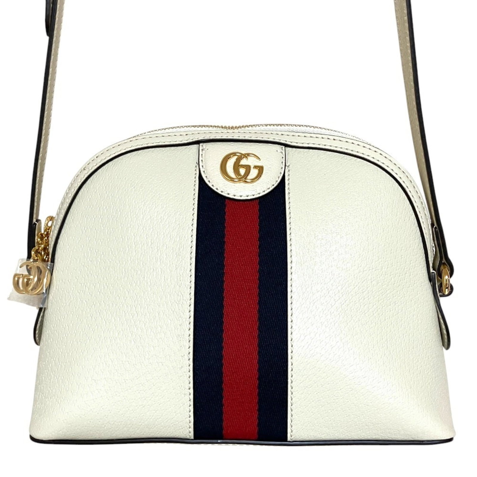 Shoulder Bag: Shoulder Bag The Gucci GG Marmont shoulder bag boasts a sleek off-white color and a spacious interior, making it a versatile and stylish accessory for everyday use. With a sturdy design and