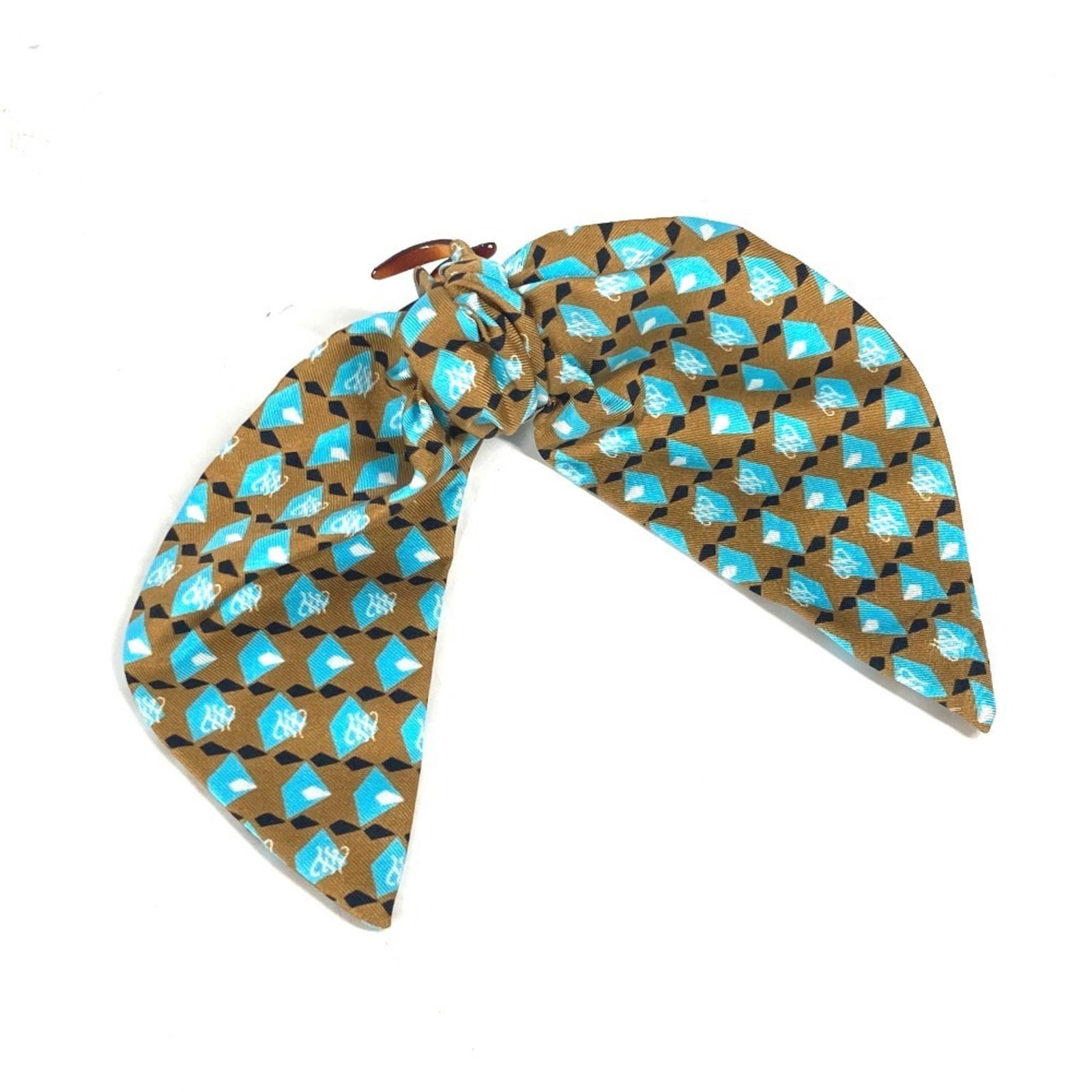 Clip Hair Fendi Silk: Clip Hair Fendi Silk Clip Hair Fendi Silk is a luxurious hair clip made from high-quality silk. The elegant design and rich material make it a stylish accessory for any occasion. Its sleek 15.5cm size