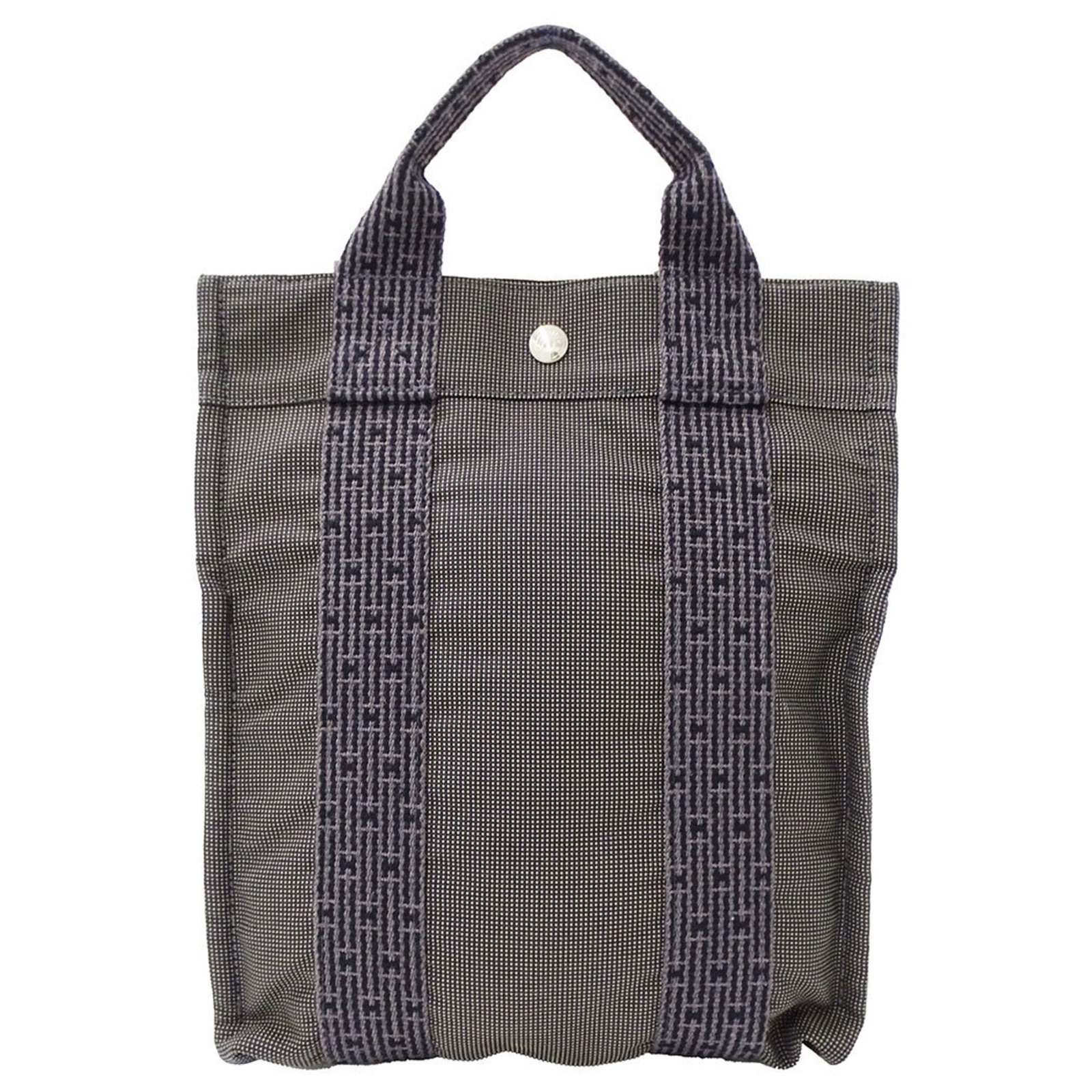 Handbag Canvas: Handbag Canvas Canvas handbag from Hermes, made in France, with a gray color and everyday style. Measuring 30cm x 26cm x 6cm, it features a sturdy canvas material. This canvas handbag is a