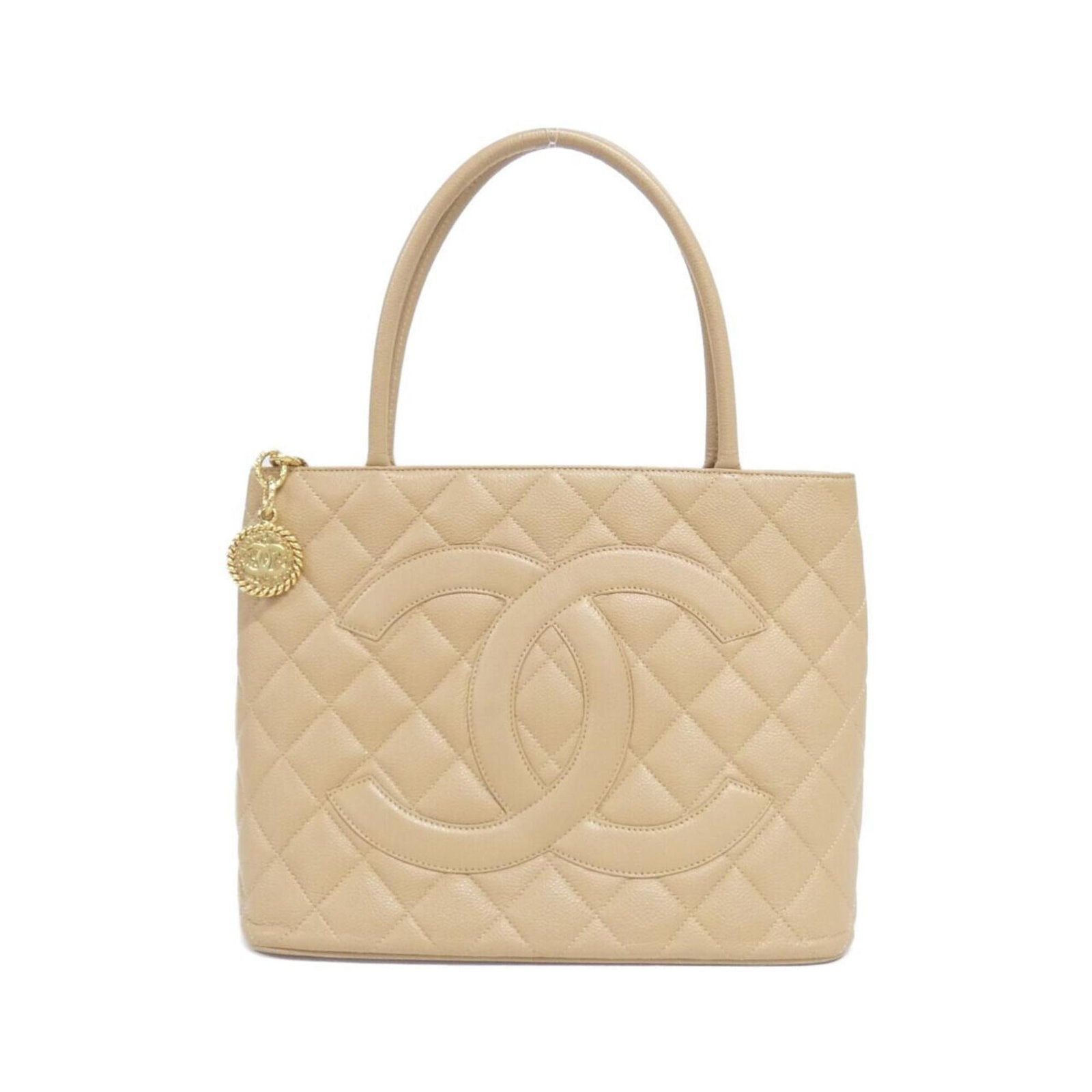 Calfskin Handbag Chanel: Calfskin Handbag Chanel Grained Calfskin Handbag in Beige. This Chanel MPN 1804 handbag features a classic design with a 25cm x 30cm x 14cm size. Made from high-quality Grained Calfskin, its timeless
