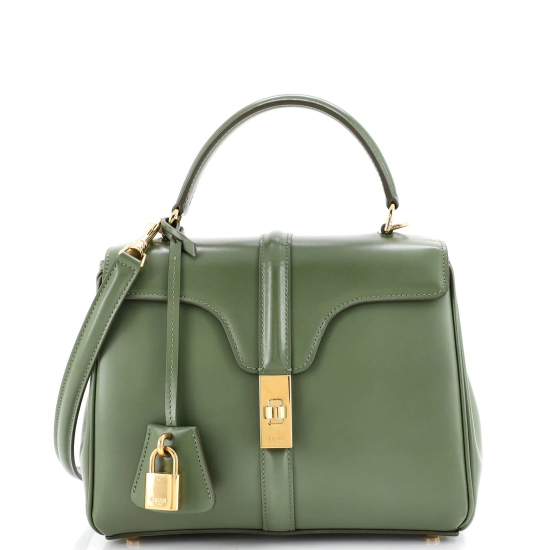 Calfskin Handle Top Bag Small Celine 16: Calfskin Handle Top Bag Small Celine 16 The Calfskin Handle Top Bag Small Celine 16 boasts a sleek, green exterior crafted from high-quality leather, complete with smooth calfskin details. Measuring