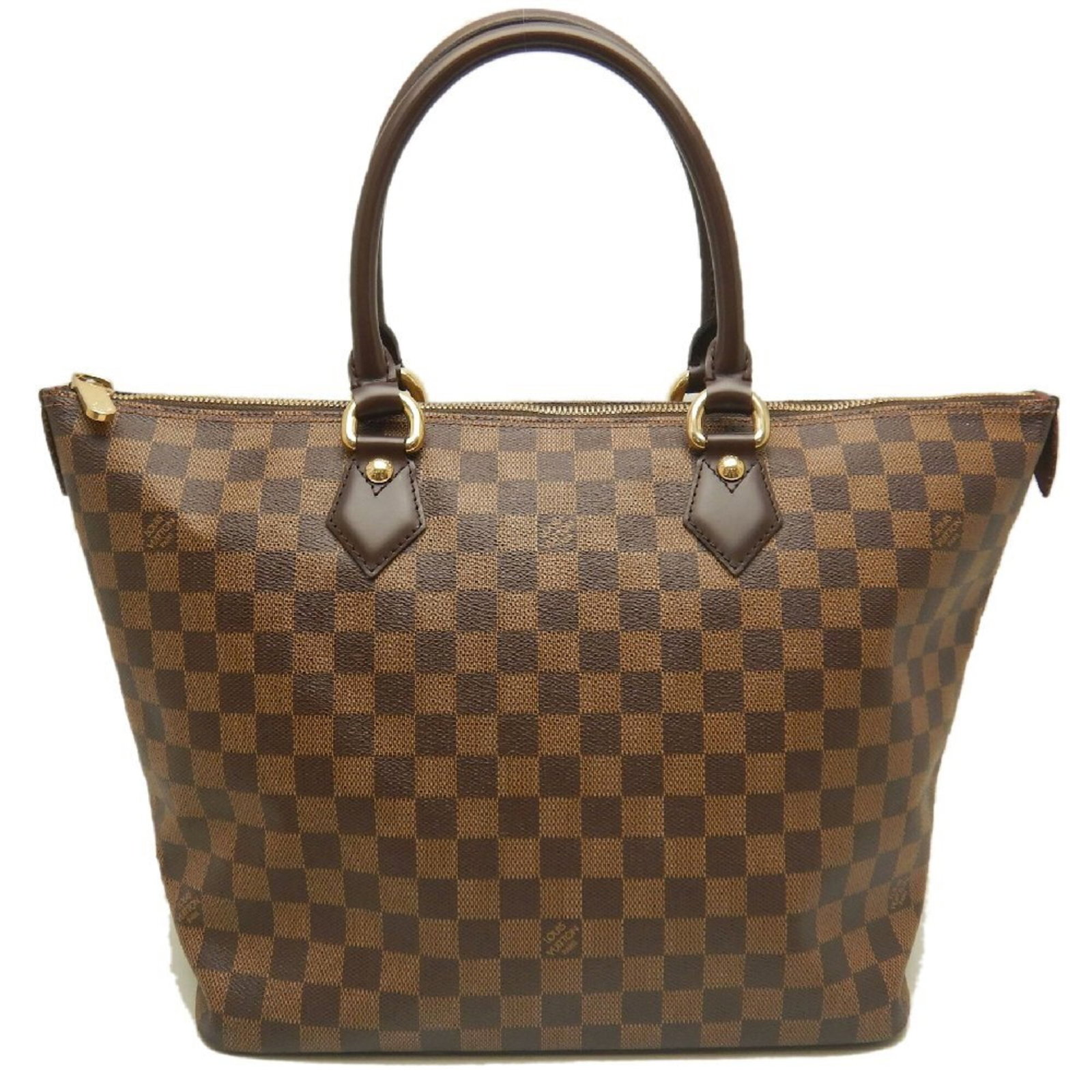 Damier Canvas Louis Vuitton Tote: Damier Canvas Louis Vuitton Tote Damier Canvas Louis Vuitton Tote is made from Damier Canvas and features Ebene hardware and a gold zipper closure. The bag measures 28.5cm x 44cm x 18cm and is
