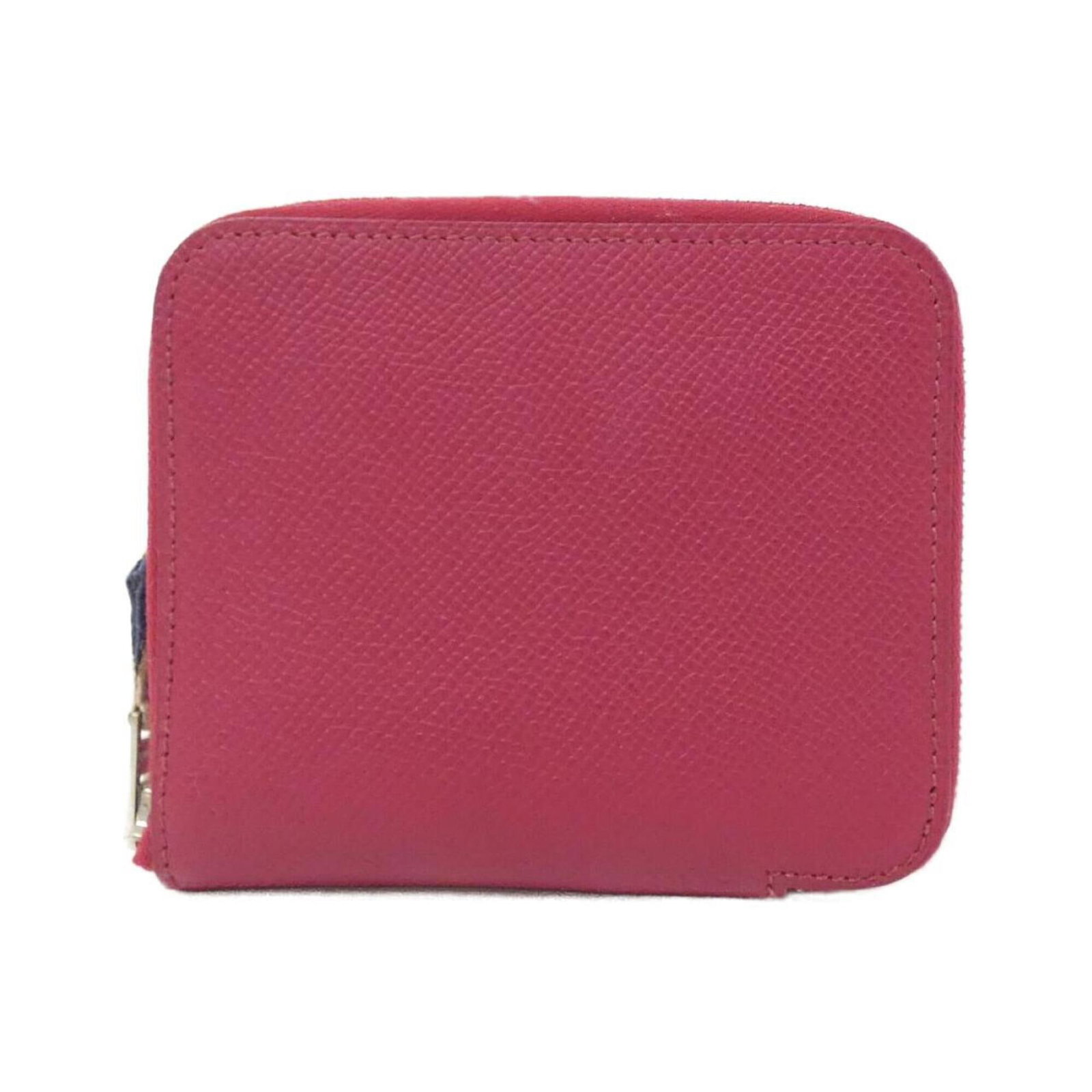 Hermes Coin Purse/ Coin Case Epsom Leather Silk: Hermes Coin Purse/ Coin Case Epsom Leather Silk Epsom leather and silk come together in this elegant coin purse from Hermes, featuring a classic design and subtle coloration in Ruby hue. Measuring 9cm