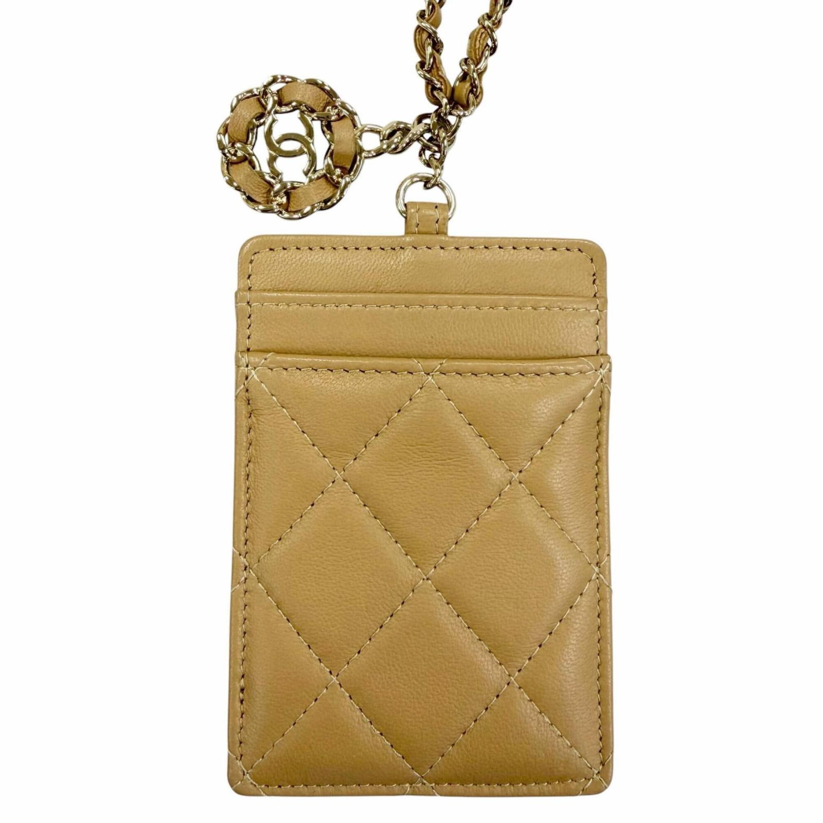 Chanel Card Case Leather: Chanel Card Case Leather Chanel's iconic card case is crafted from luxurious lambskin leather, featuring a timeless beige color that exudes elegance. Measuring 10.5cm x 7cm, this compact case is perfe