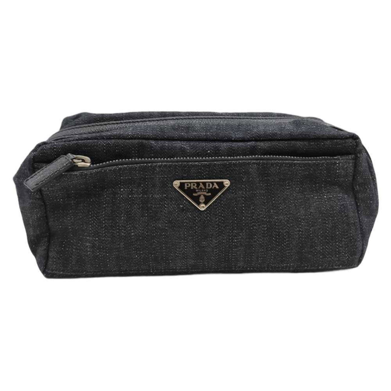 Pouch Denim Prada: Pouch Denim Prada Pouch Denim Prada is a unique navy denim pouch with a zipper closure, measuring 10cm x 22cm x 10cm. This denim pouch bears a signature, and its weight is 152g. The pouch is made of d