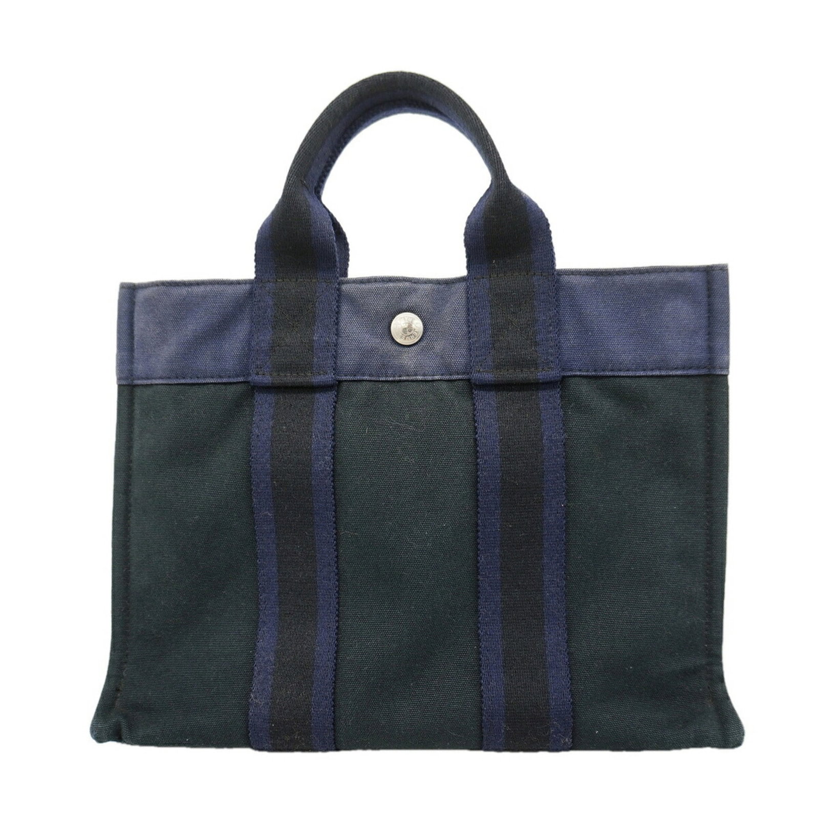 Canvas tote bag Hermes: Canvas tote bag Hermes Canvas tote bag from Hermes, made from high-quality canvas material in a sleek black color, finished with silver hardware for a touch of sophistication. Measuring 23cm x 30.5cm