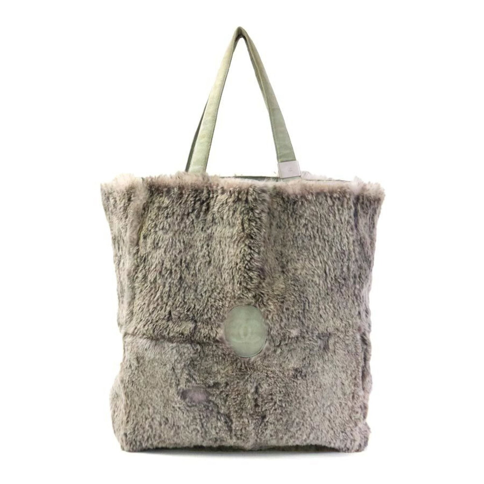 Fur Suede Handbag Tote Chanel: Fur Suede Handbag Tote Chanel Fur suede handbag tote from Chanel, crafted in France with a distinctive beige and gray color combination. Measuring 37cm x 27.5cm x 10cm, this stylish tote features a