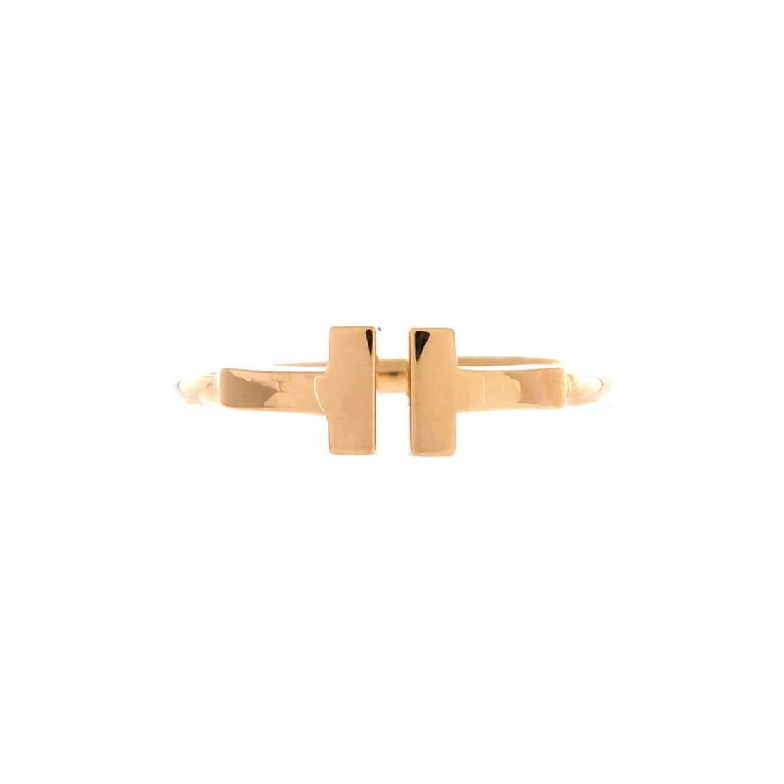 Tiffany Co T Wire Ring 18K Rose Gold: Tiffany Co T Wire Ring 18K Rose Gold 18K Rose Gold T Wire Ring from Tiffany & Co. - A stunning example of Tiffany's iconic design, this 18K rose gold T wire ring boasts a sleek, modern aesthetic. The 