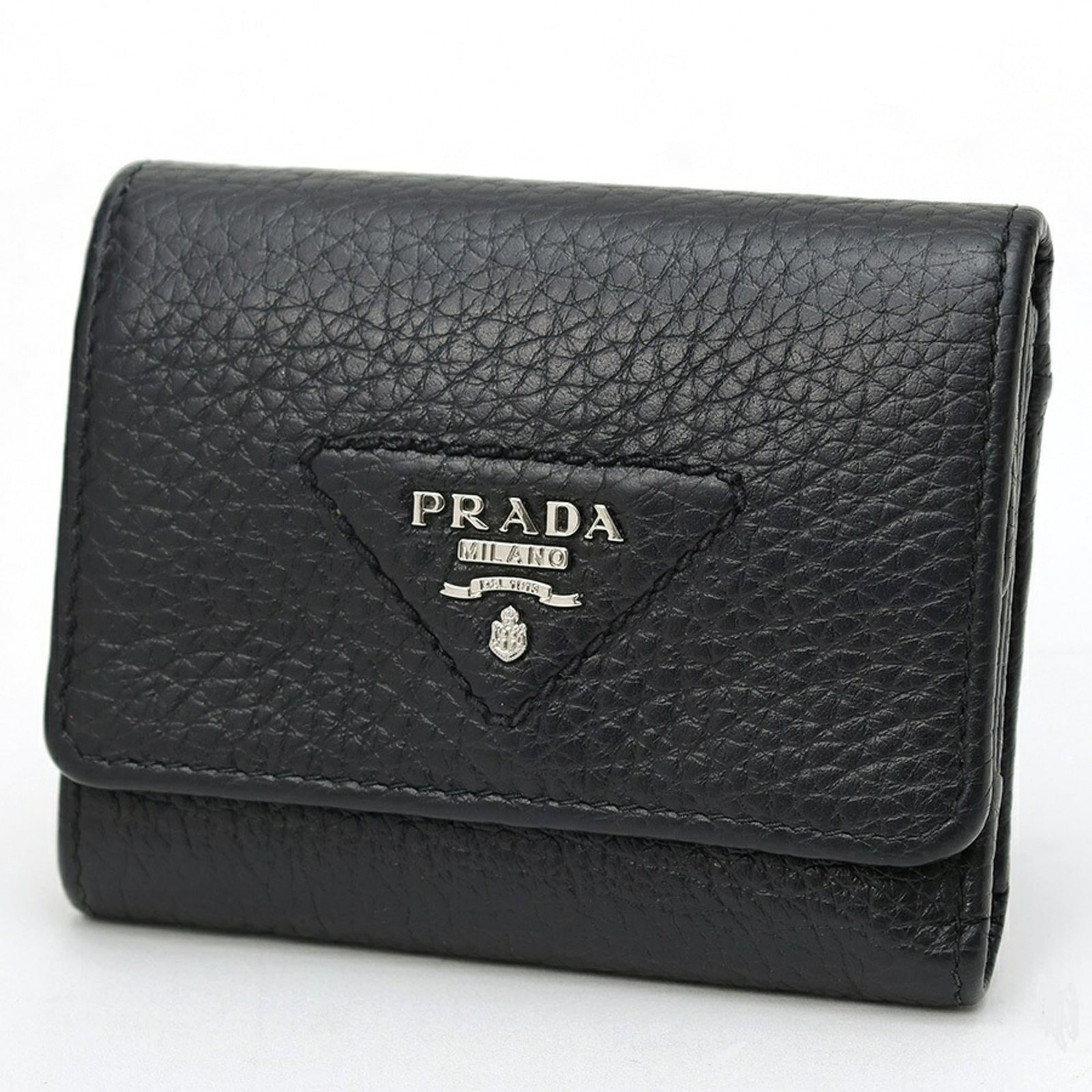 Prada Wallet (Tri-Fold) Leather: Prada Wallet (Tri-Fold) Leather Prada's tri-fold leather wallet is crafted from high-quality black leather, measuring 8.5cm x 10cm. This classic design features a timeless tri-fold layout, perfect