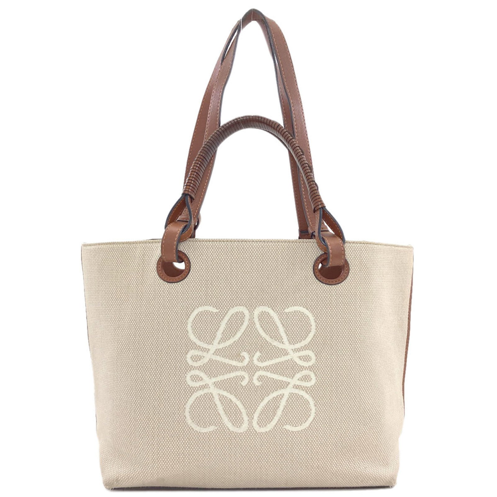 Canvas tote bag Loewe: Canvas tote bag Loewe Canvas tote bag from Loewe, available in beige, with dimensions 24cm x 38cm x 14cm. This canvas tote bag from the renowned brand Loewe features a classic design with a neutral