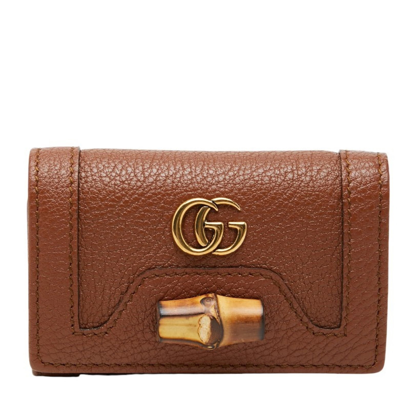 Keycase Leather Gucci: Keycase Leather Gucci Keycase Leather Gucci is made from high-quality leather, measuring 6.5cm x 9.5cm x 3cm, and features a classic brown color. The signature is present, bearing the mark of the