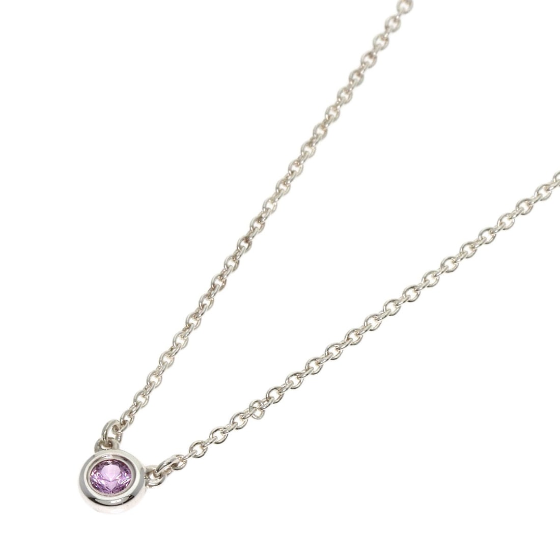 Tiffany&Co. By The Yard Pink Sapphire Necklace Silver: Tiffany&Co. By The Yard Pink Sapphire Necklace Silver Tiffany&Co.'s By The Yard Pink Sapphire Necklace is a stunning silver piece featuring a main stone of pink sapphire. The necklace boasts a sleek d