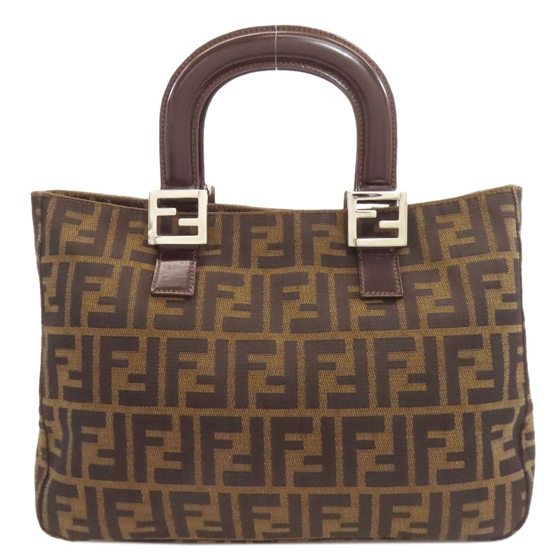 Canvas Leather Handbag Zucca Fendi Pattern: Canvas Leather Handbag Zucca Fendi Pattern Canvas Leather Handbag with Zucca Fendi Pattern. This brown canvas handbag features a distinctive Fendi pattern. The canvas exterior provides a unique touch