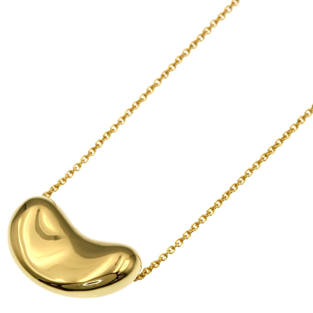 Yellow Gold Tiffany&Co K18 Bean Necklace: Yellow Gold Tiffany&Co K18 Bean Necklace K18 Yellow Gold Tiffany&Co Bean Necklace, a sleek and modern design, features a 16.1inch length of high-quality K18 yellow gold metal. This stylish necklace