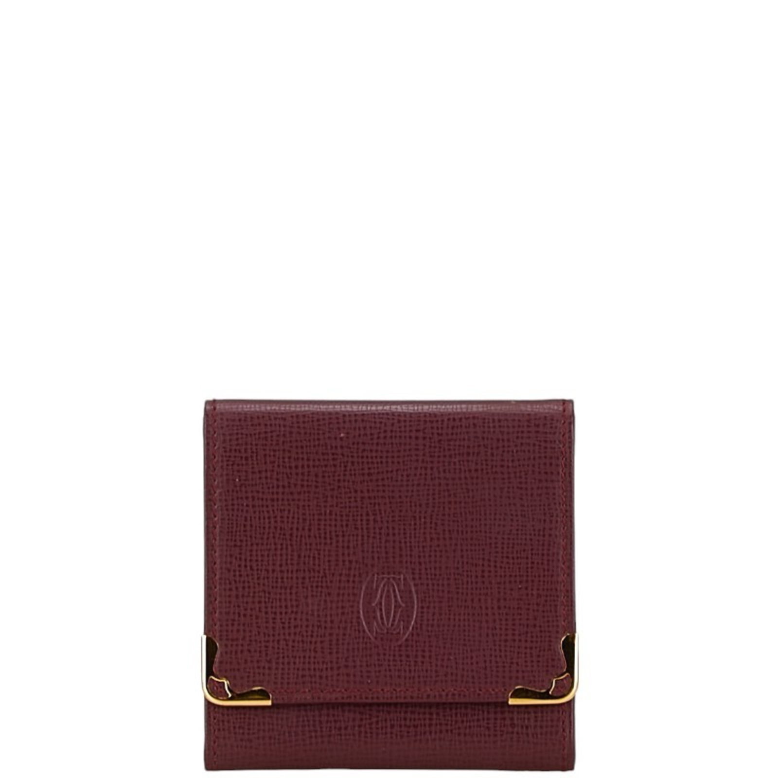 Coin Case Leather Purse Cartier: Coin Case Leather Purse Cartier Cartier's Bordeaux leather coin case is a sleek and elegant accessory, measuring 8cm x 8cm x 1cm. This beautifully crafted leather purse comes with a sturdy box and