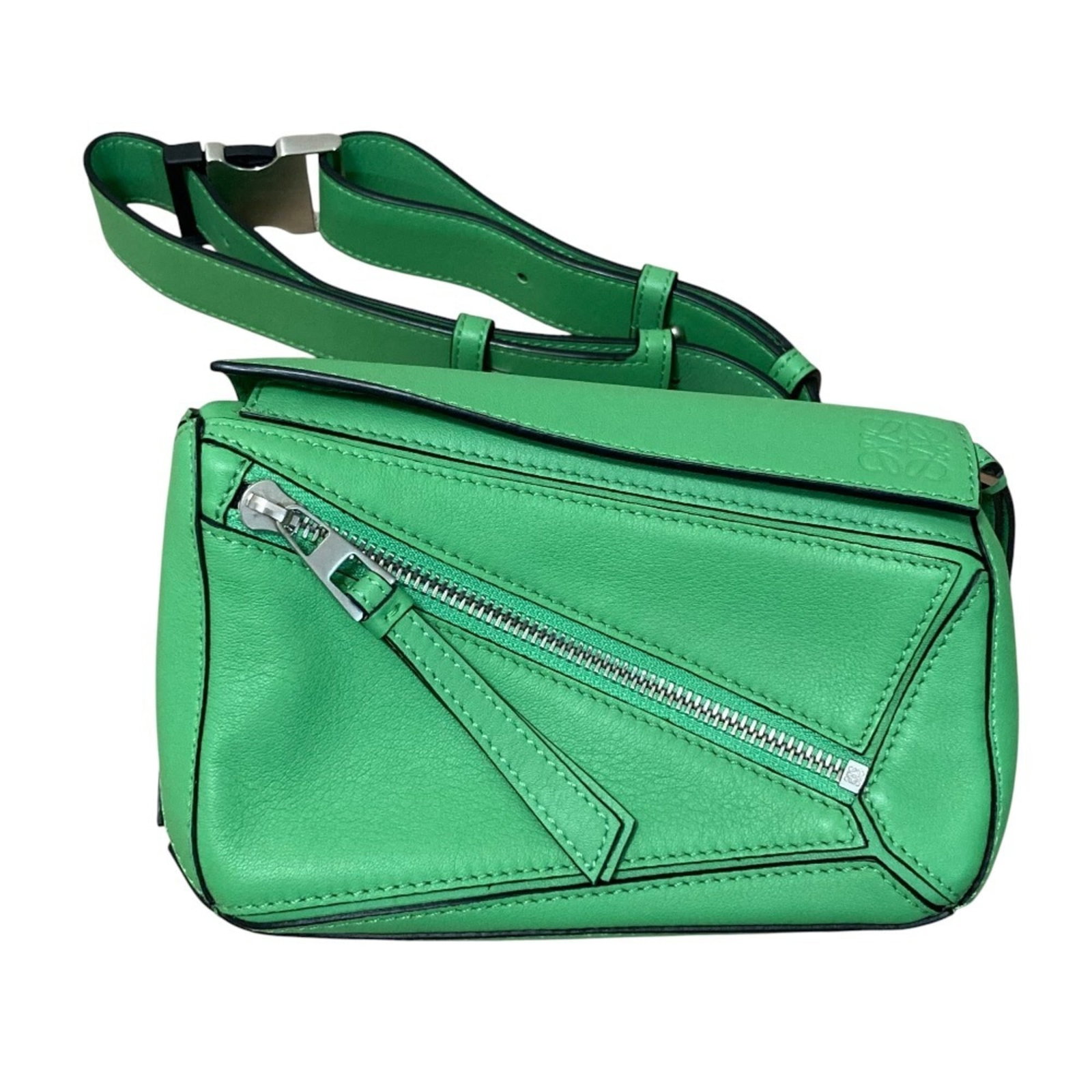 Sling Bag Shoulder Bag: Sling Bag Shoulder Bag The Loewe MPN B510U89X02 Sling Bag Shoulder Bag is a stylish and compact accessory, measuring 10cm x 19cm x 8cm. Its vibrant green color and sleek design make it a versatile add