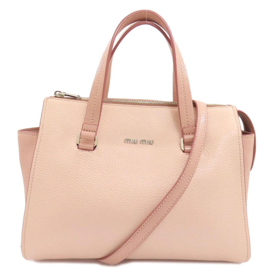 Handbag Leather 2Way Miumiu: Handbag Leather 2Way Miumiu Pink leather handbag from MIUMIU, featuring a 2-way design. Made from high-quality leather, this stylish bag is a great addition to any wardrobe. Item Specifics: Brand: