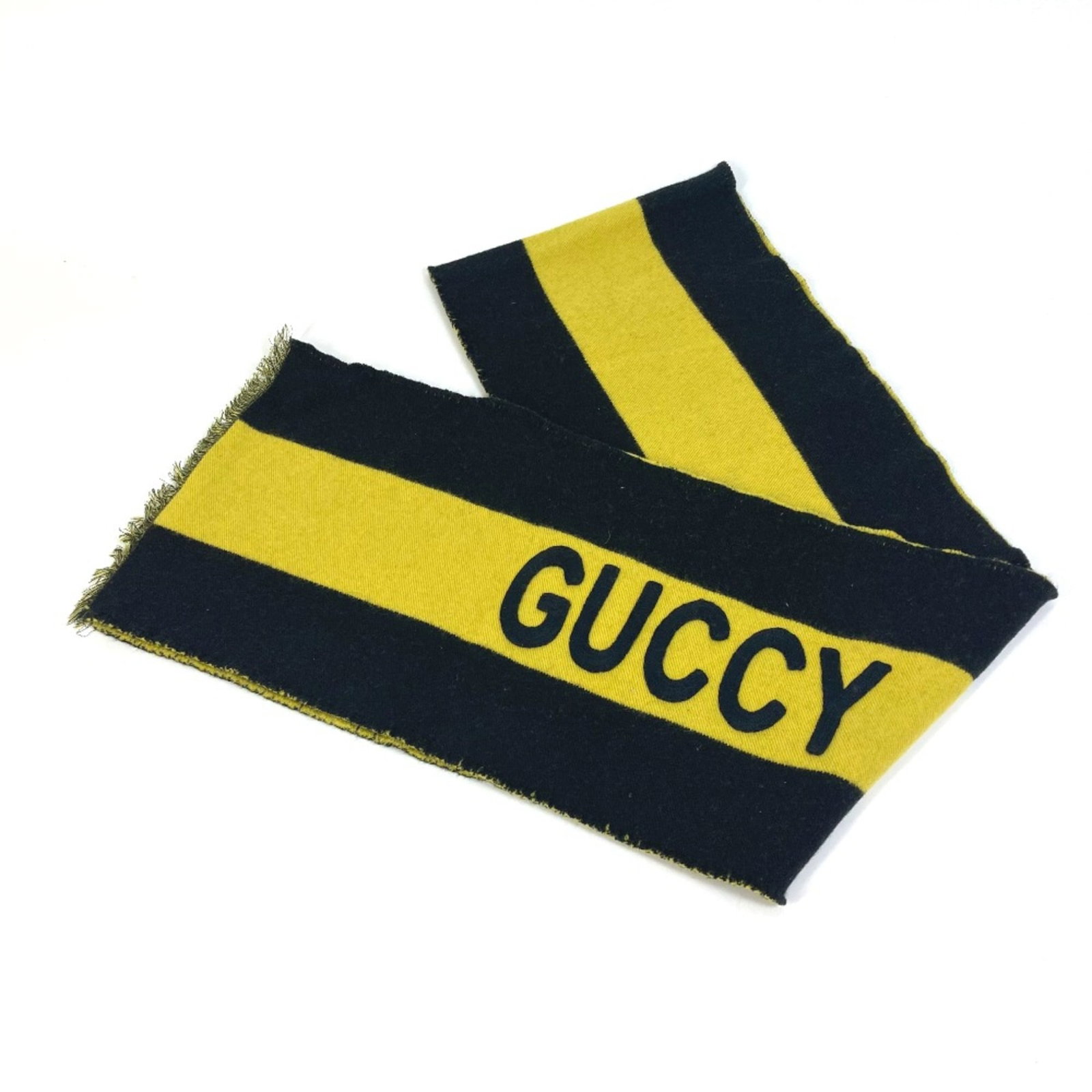 Stole Wool from Gucci: Stole Wool from Gucci Stole Wool from Gucci is a striking black wool stole with a size of W8.9 x H71.3inch / W22.5cm x H181cm, making it a unique accessory for those who appreciate the brand's