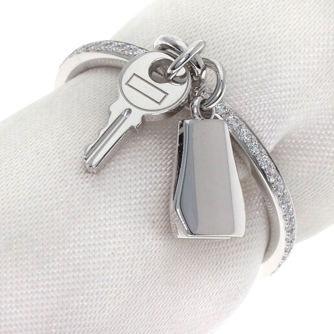 Kelly Clochette Ring Diamond White Gold K18 Hermes Pm: Kelly Clochette Ring Diamond White Gold K18 Hermes Pm K18 White Gold Diamond Ring from Hermes Pm, featuring a silver metal exterior with a diamond main stone. This ring is crafted from 18k gold, offer