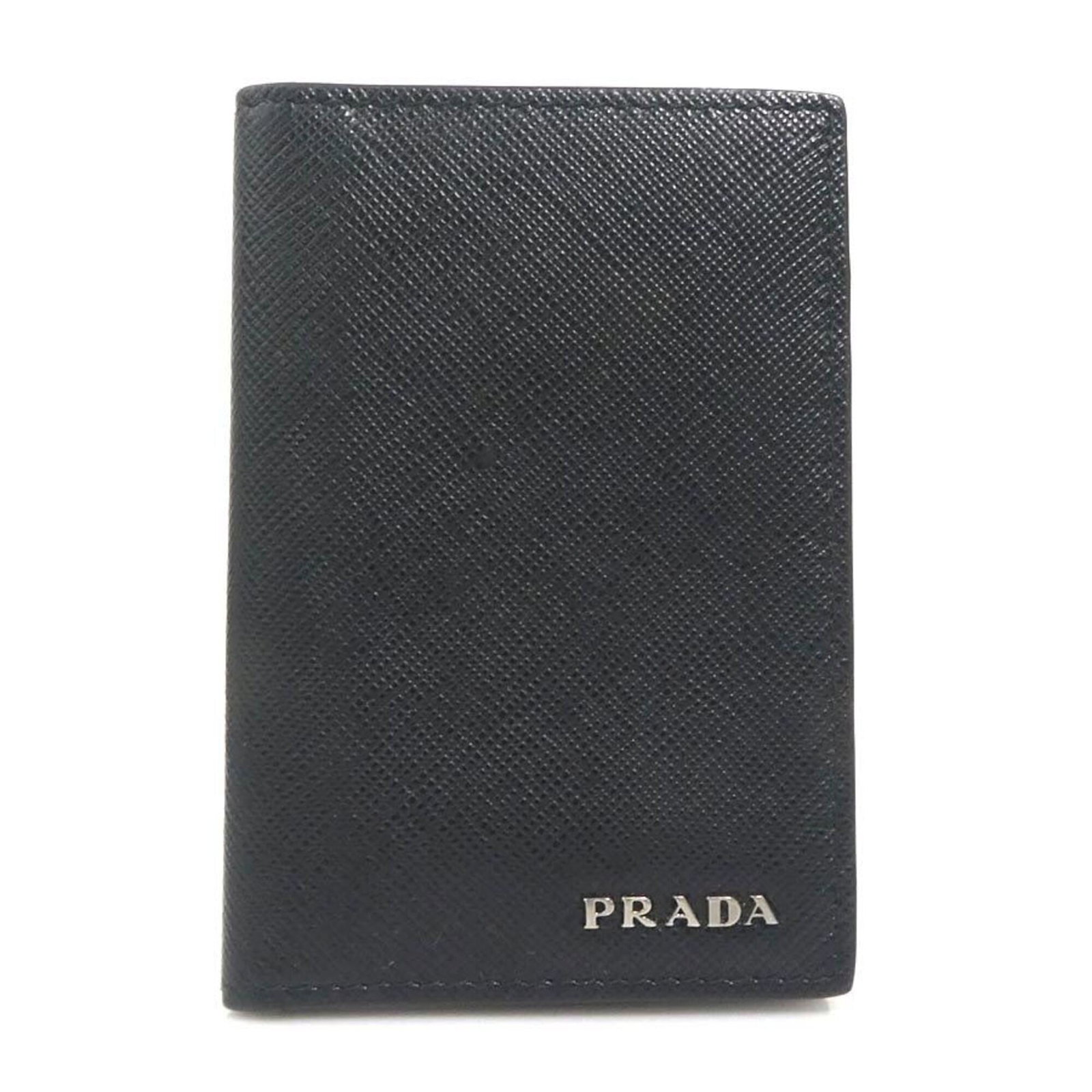 Case card Prada Leather: Case card Prada Leather Prada's card case is crafted from high-quality leather, offering a sleek and sophisticated design. Measuring 11cm x 7.5cm x 5mm, it provides a compact and elegant way to carry