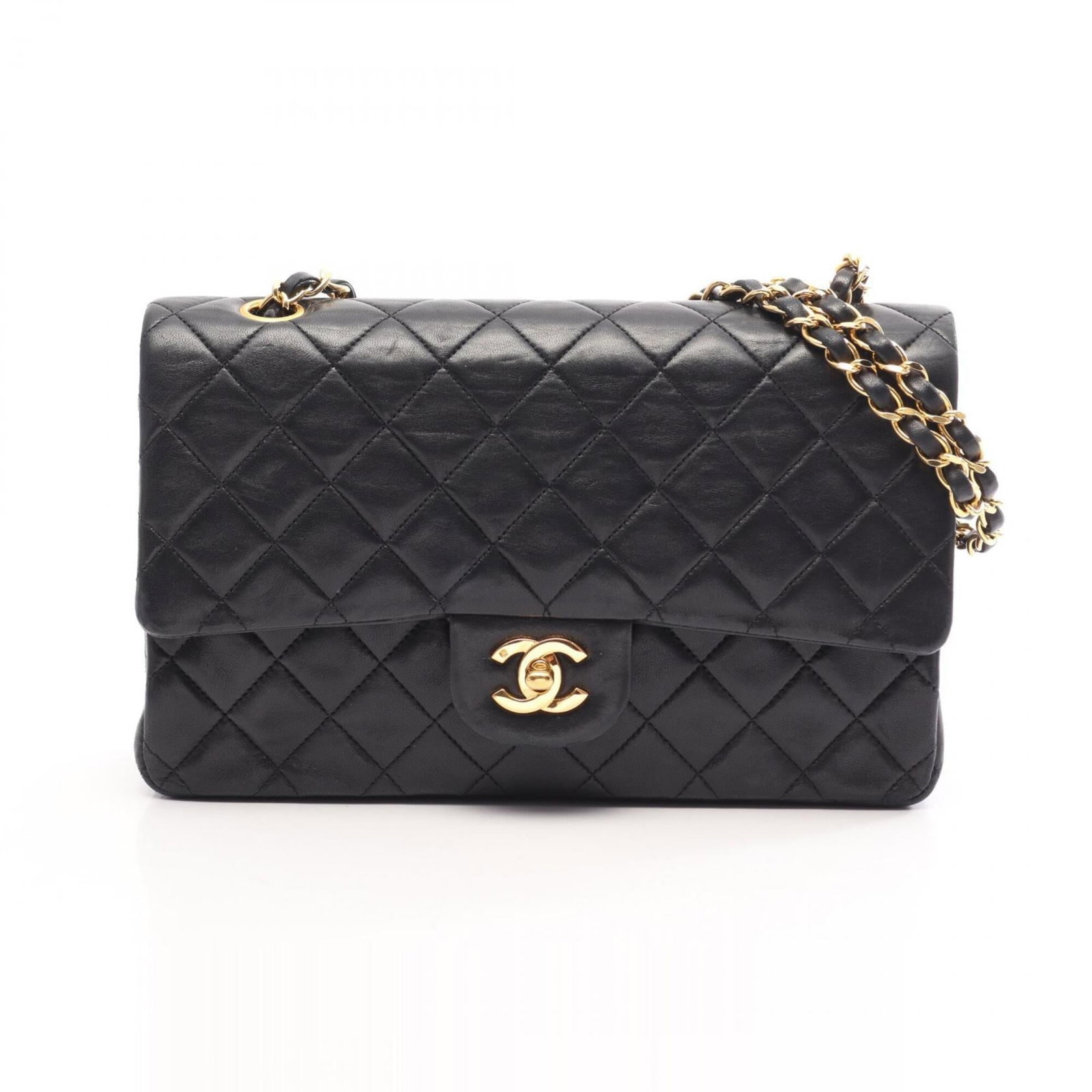 Shoulder Bag Leather Handbag Chanel: Shoulder Bag Leather Handbag Chanel Leather shoulder bag from Chanel, made from lambskin, features a sleek black design. With dimensions of 16cm x 25cm x 6.5cm, this handbag is a stylish accessory