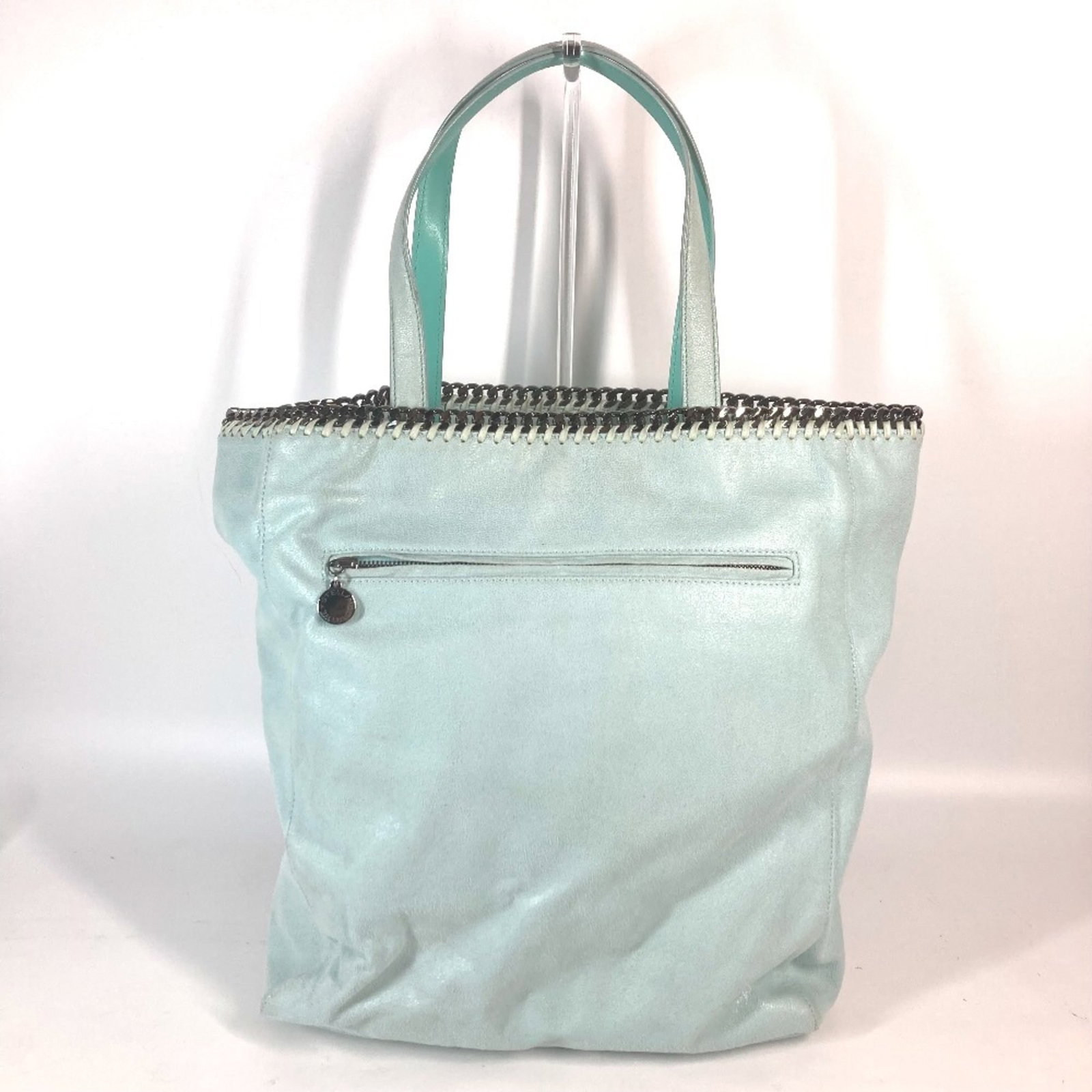 Tote Bag Stella Mccartney Handbag: Tote Bag Stella Mccartney Handbag Mint blue tote bag from Stella McCartney, featuring a signature that bears the artist's name. This 40.5cm x 33cm x 10.5cm bag comes with a dust bag for added