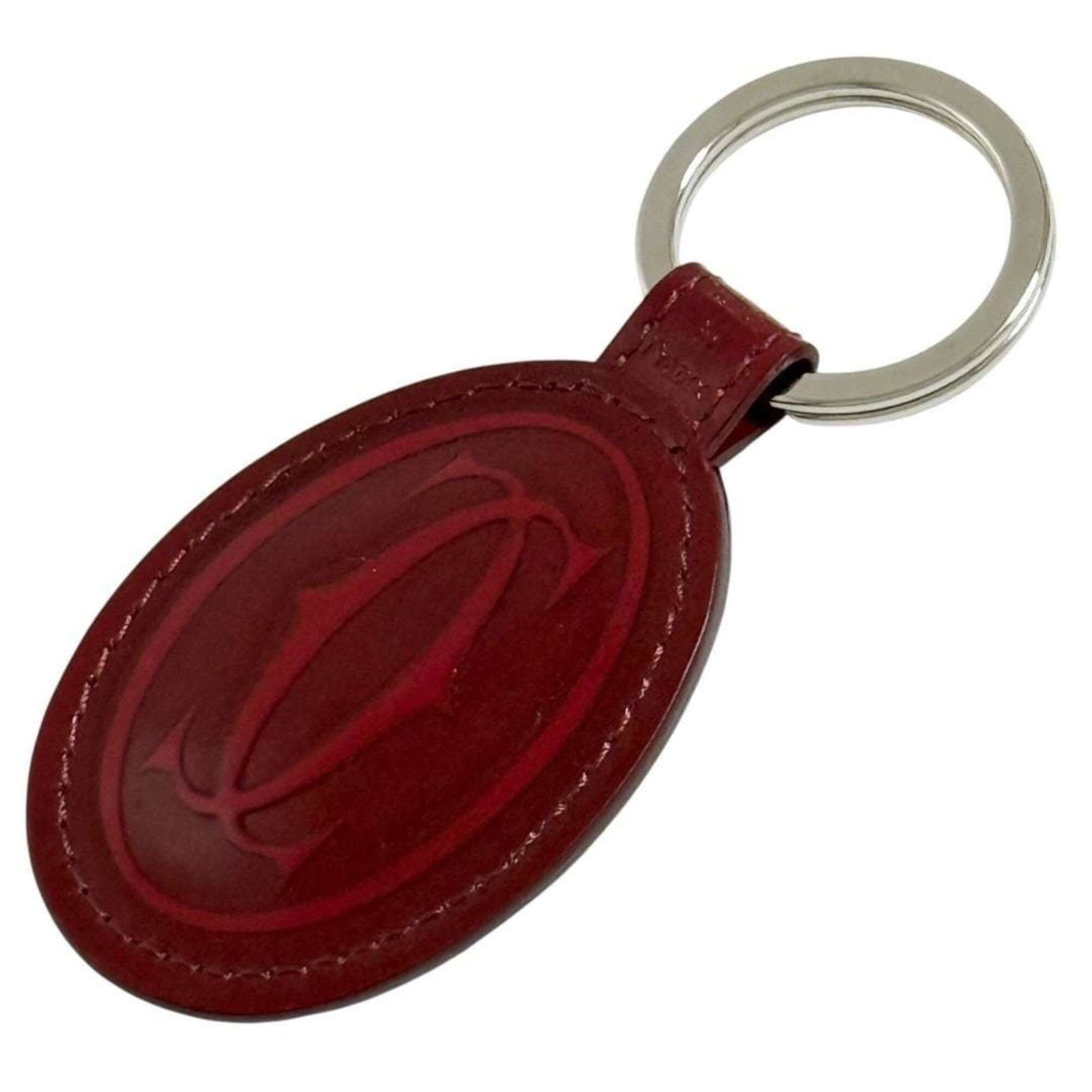 Keyring Leather Metal Cartier: Keyring Leather Metal Cartier Cartier's signature leather and metal blend creates a sophisticated keyring that exudes elegance. Made in France, this keyring boasts a classic design and premium materia