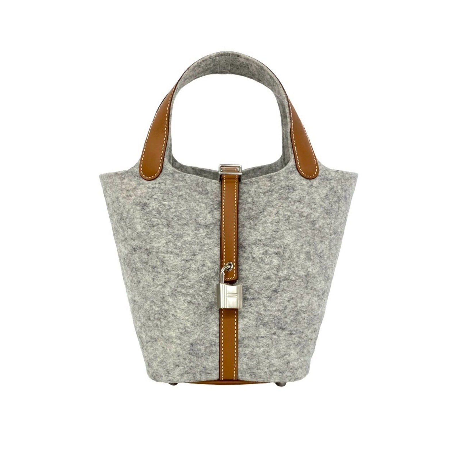 Swift felt leather handbag Hermes: Swift felt leather handbag Hermes Swift felt leather handbag from Hermes, featuring a unique combination of felt and swift leather in a brown and gray color palette. Measuring 19cm x 13cm x 18cm,