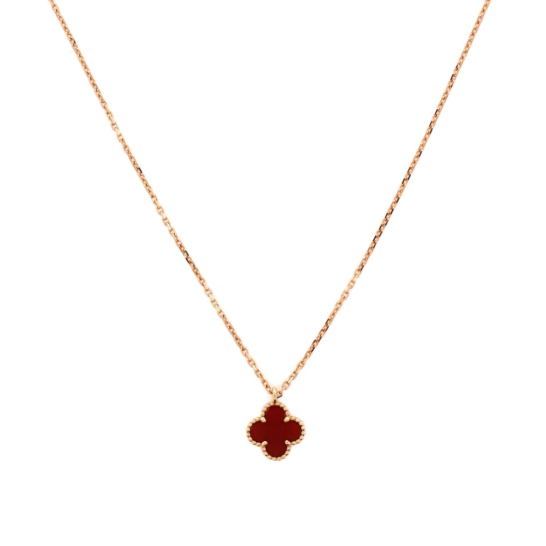 Carnelian Necklace Rose Gold Pendant Alhambra Sweet Van Cleef & Arpels: Carnelian Necklace Rose Gold Pendant Alhambra Sweet Van Cleef & Arpels 18K Rose Gold and Carnelian Sweet Alhambra Pendant Necklace. This exquisite necklace showcases a stunning 18K rose gold Sweet Alh