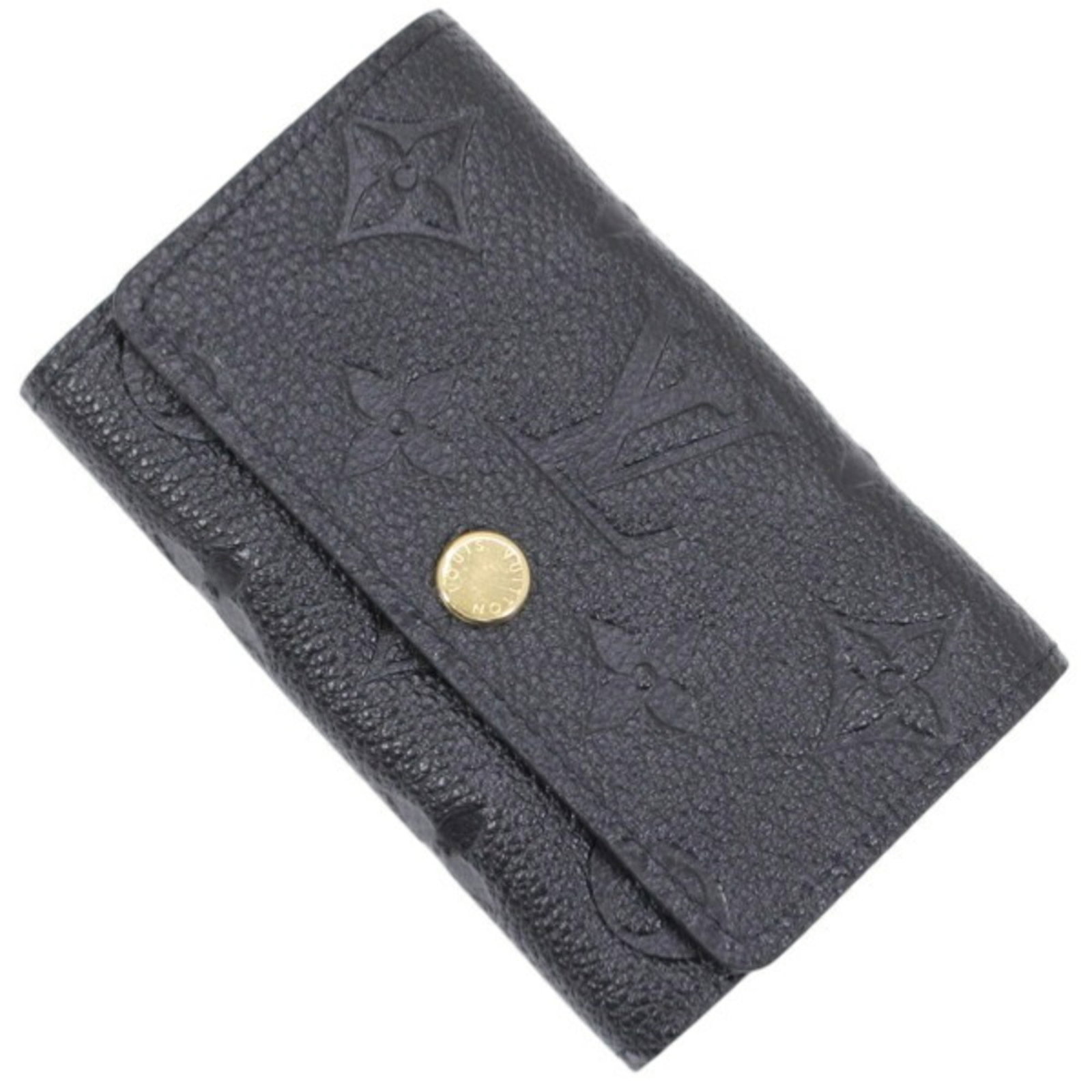 Keycase Monogram Louis Vuitton Empreinte: Keycase Monogram Louis Vuitton Empreinte The Louis Vuitton Empreinte Keycase is a sleek and sophisticated accessory, featuring the iconic Monogram Empreinte pattern in black. This compact case