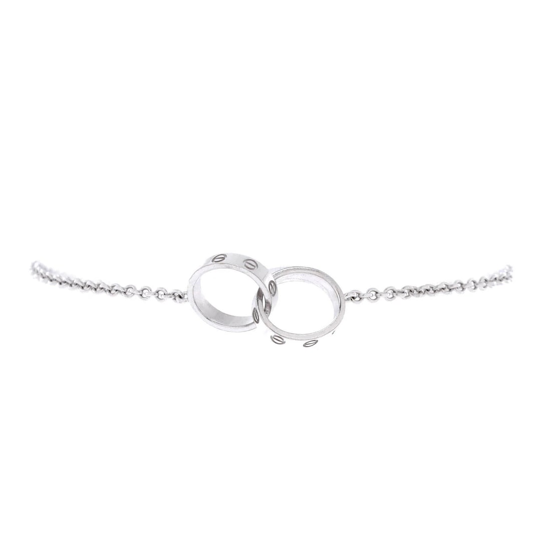 Love Interlocking Cartier 18K White Gold Bracelet: Love Interlocking Cartier 18K White Gold Bracelet Love Interlocking Cartier 18K White Gold Bracelet - A timeless piece of elegance, this 18K white gold bracelet features interlocking hearts that