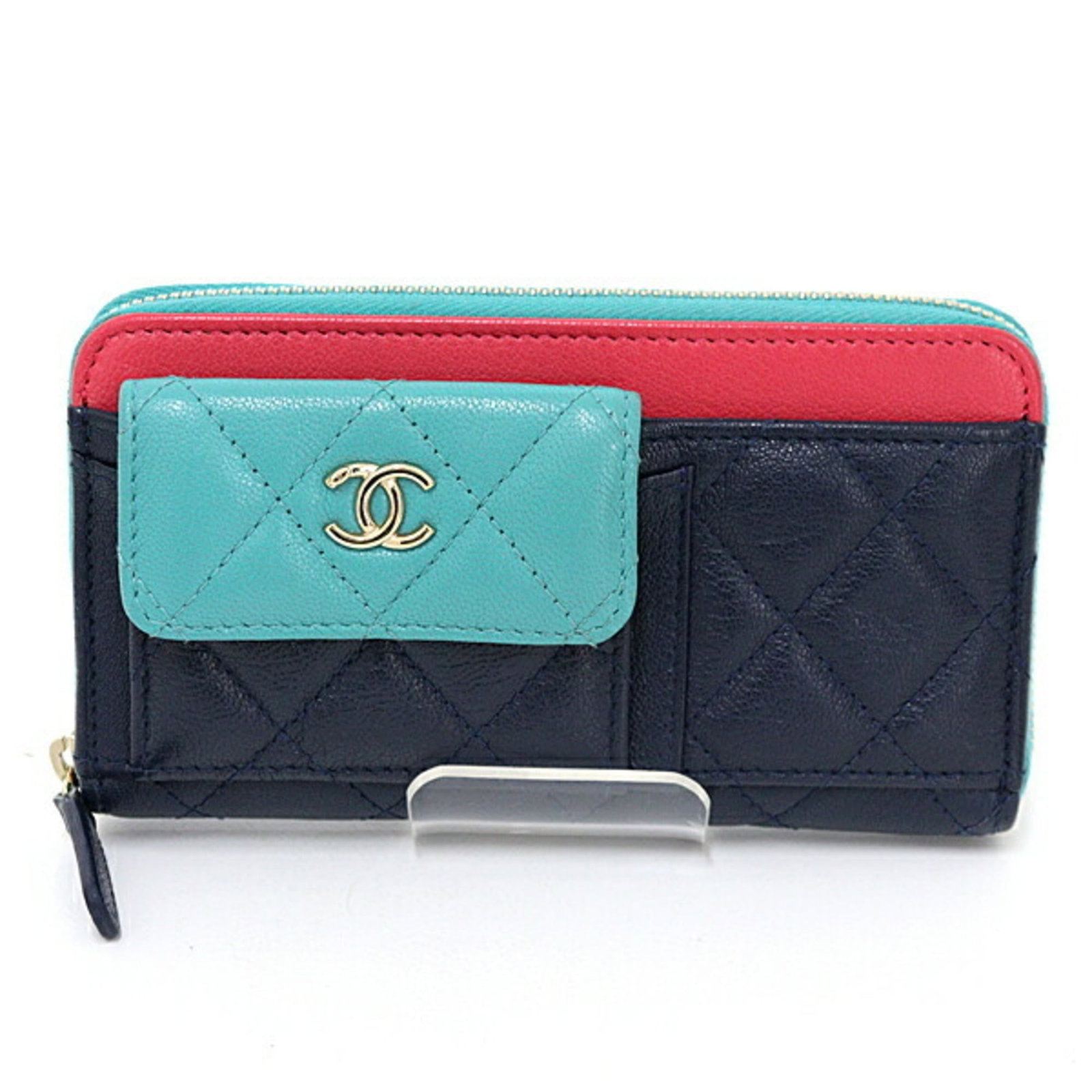 Chanel Wallet (Bi-Fold) Leather: Chanel Wallet (Bi-Fold) Leather This bi-fold leather wallet from Chanel features a classic design with a rich green, navy, or pink goatskin finish. The wallet comes with its original box, dust bag,